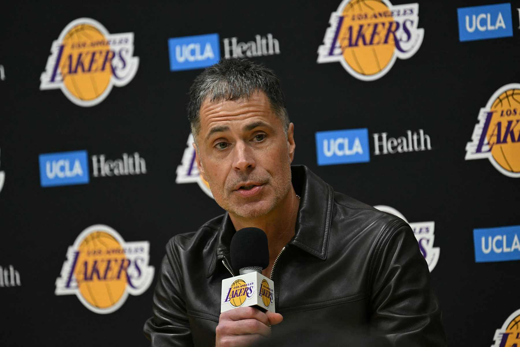 Los Angeles Lakers general manager Rob Pelinka speaks during the presentation of the new Los Angeles Lakers player Slovenian basketball player Luka Doncic at the UCLA Health Training Center, in El Segundo, California on February 4, 2025. Slovenian star Luka Doncic said February 2, 2025 he thought he'd spend his entire NBA career in Dallas, thanking fans in Texas for making it feel like home a day after the Mavericks abruptly traded him to the Los Angeles Lakers. (Photo by Patrick T. Fallon / AFP) (Photo by PATRICK T. FALLON/AFP via Getty Images)          