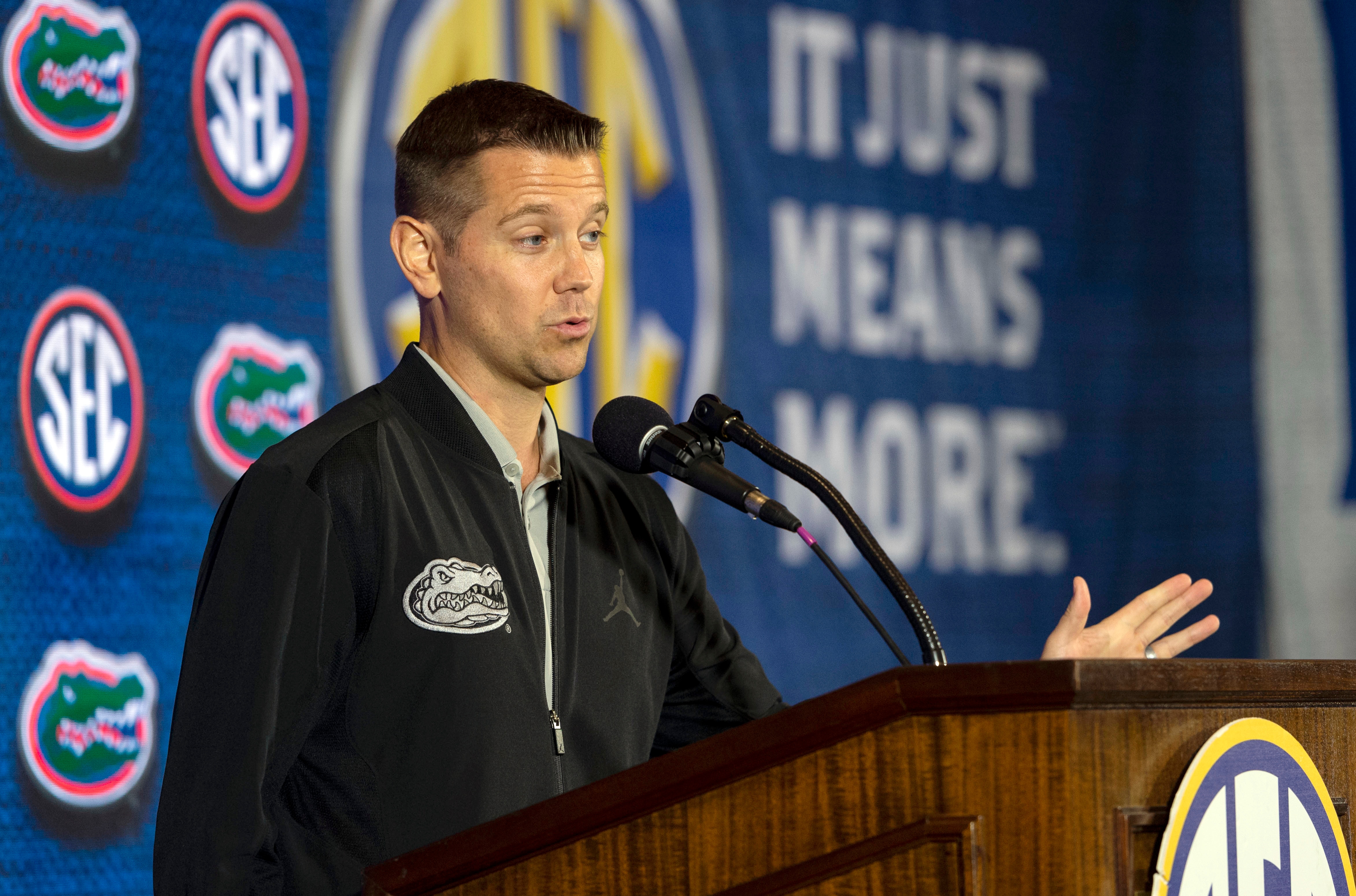 Florida head coach Cam Newbauer speaks during the Southeastern Conference women's NCAA college basketball media day, Thursday, Oct. 18, 2018, in Birmingham, Ala. (AP Photo/Vasha Hunt)
