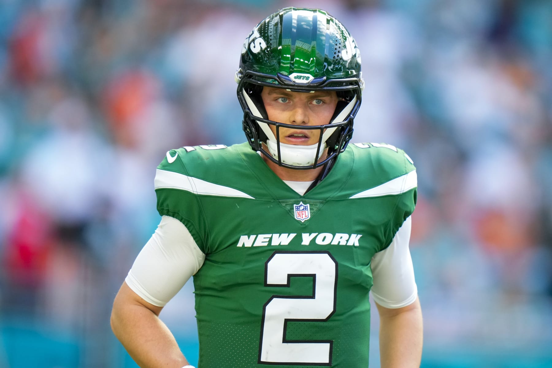 MIAMI GARDENS, FLORIDA - DECEMBER 17: Zach Wilson #2 of the New York Jets looks on against the Miami Dolphins during the first half at Hard Rock Stadium on December 17, 2023 in Miami Gardens, Florida. (Photo by Rich Storry/Getty Images) MIAMI GARDENS, FLORIDA - DECEMBER 17: Zach Wilson #2 of the New York Jets looks on against the Miami Dolphins during the first half at Hard Rock Stadium on December 17, 2023 in Miami Gardens, Florida. (Photo by Rich Storry/Getty Images)