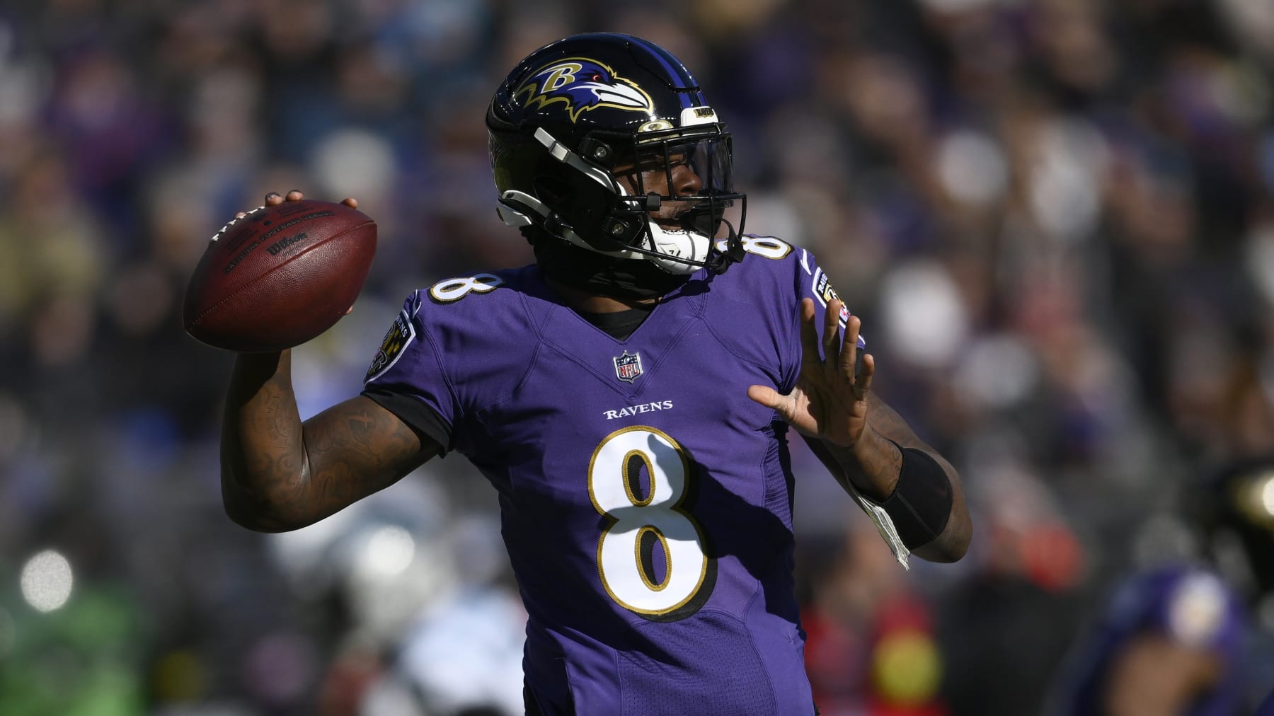 Baltimore Ravens quarterback Lamar Jackson (8) in action during the first half of an NFL football game against the Carolina Panthers, Sunday, Nov. 20, 2022, in Baltimore. (AP Photo/Nick Wass)
