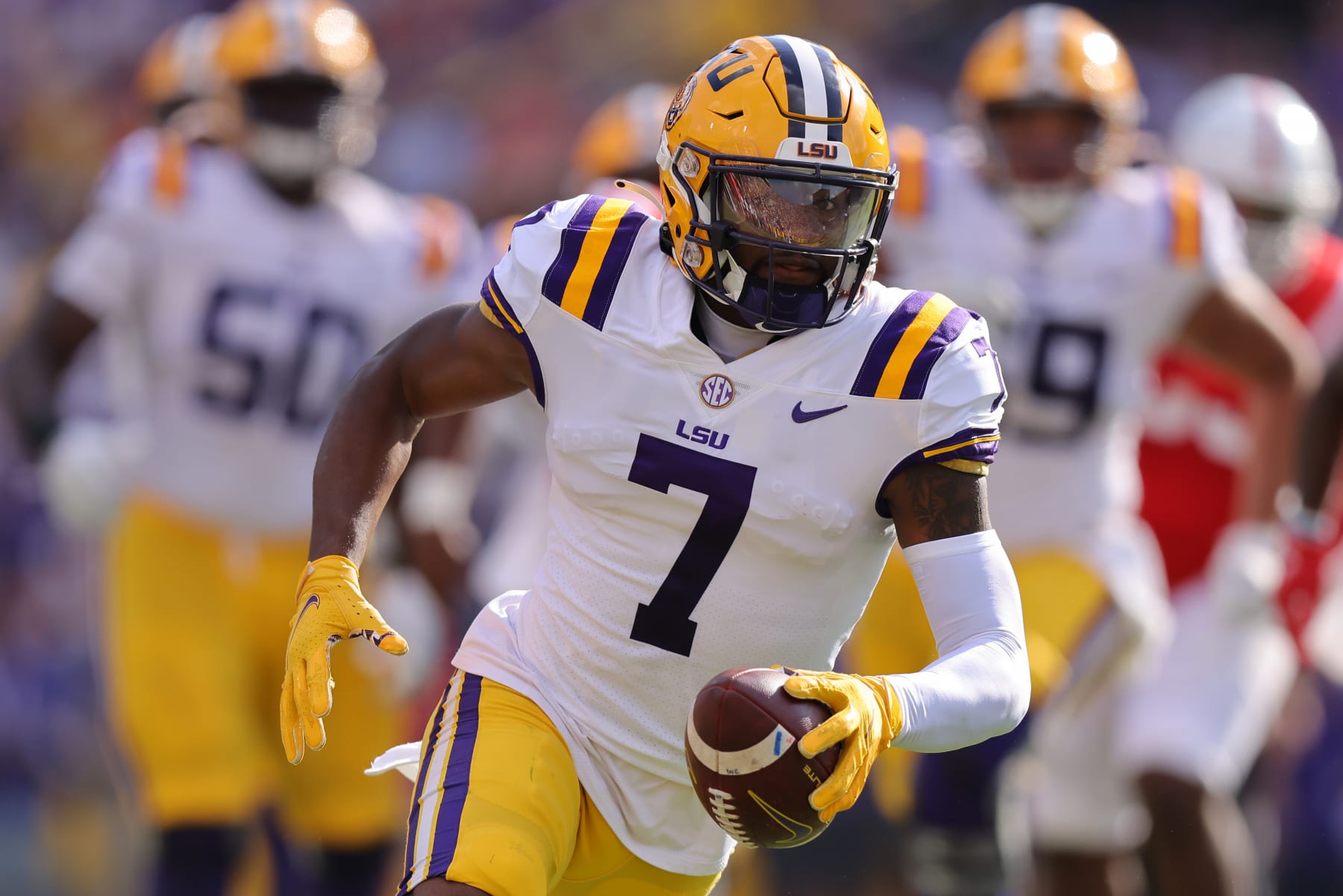 BATON ROUGE, LOUISIANA - OCTOBER 22: Kayshon Boutte #7 of the LSU Tigers runs with the ball against the Mississippi Rebels during a game at Tiger Stadium on October 22, 2022 in Baton Rouge, Louisiana. (Photo by Jonathan Bachman/Getty Images)