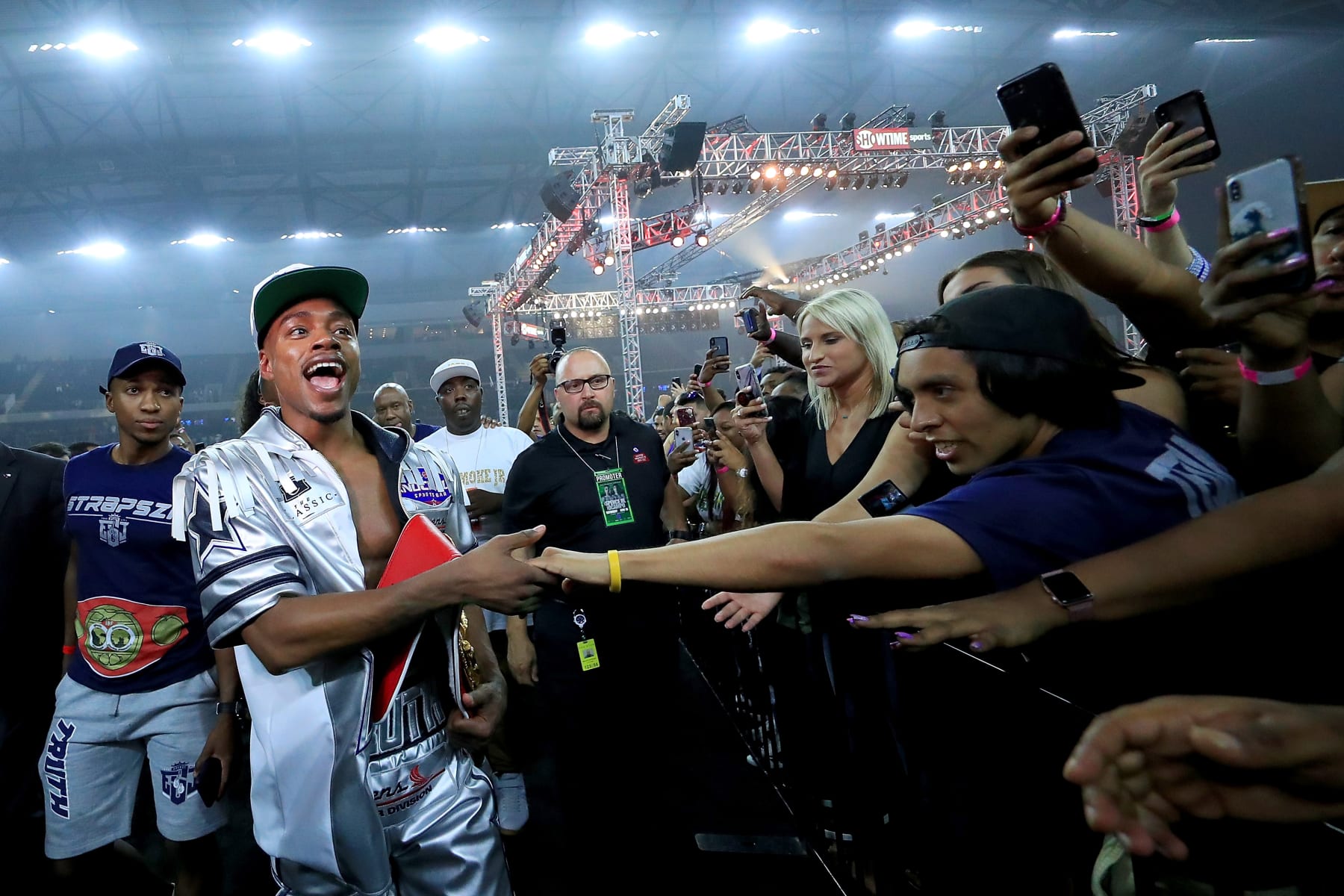 FRISCO, TX - JUNE 16:  Errol Spence Jr. celebrates with fans after knocking out Carlos Ocampo in the first round of a IBF Welterweight Championship bout at The Ford Center at The Star on June 16, 2018 in Frisco, Texas.  (Photo by Tom Pennington/Getty Images)