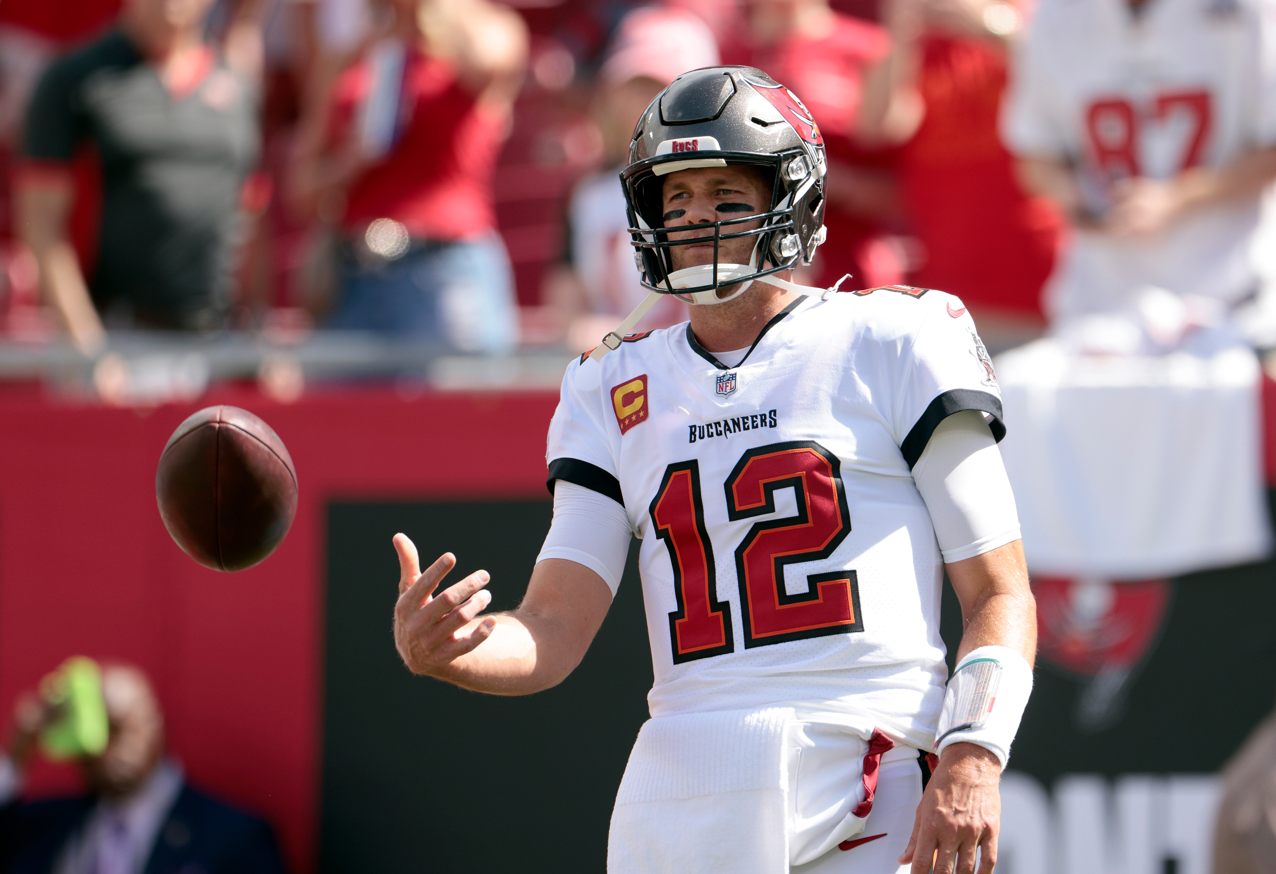 TAMPA, FLORIDA - SEPTEMBER 19: Quarterback Tom Brady #12 of the Tampa Bay Buccaneers warms up before the game against the Atlanta Falcons at Raymond James Stadium on September 19, 2021 in Tampa, Florida. (Photo by Douglas P. DeFelice/Getty Images)