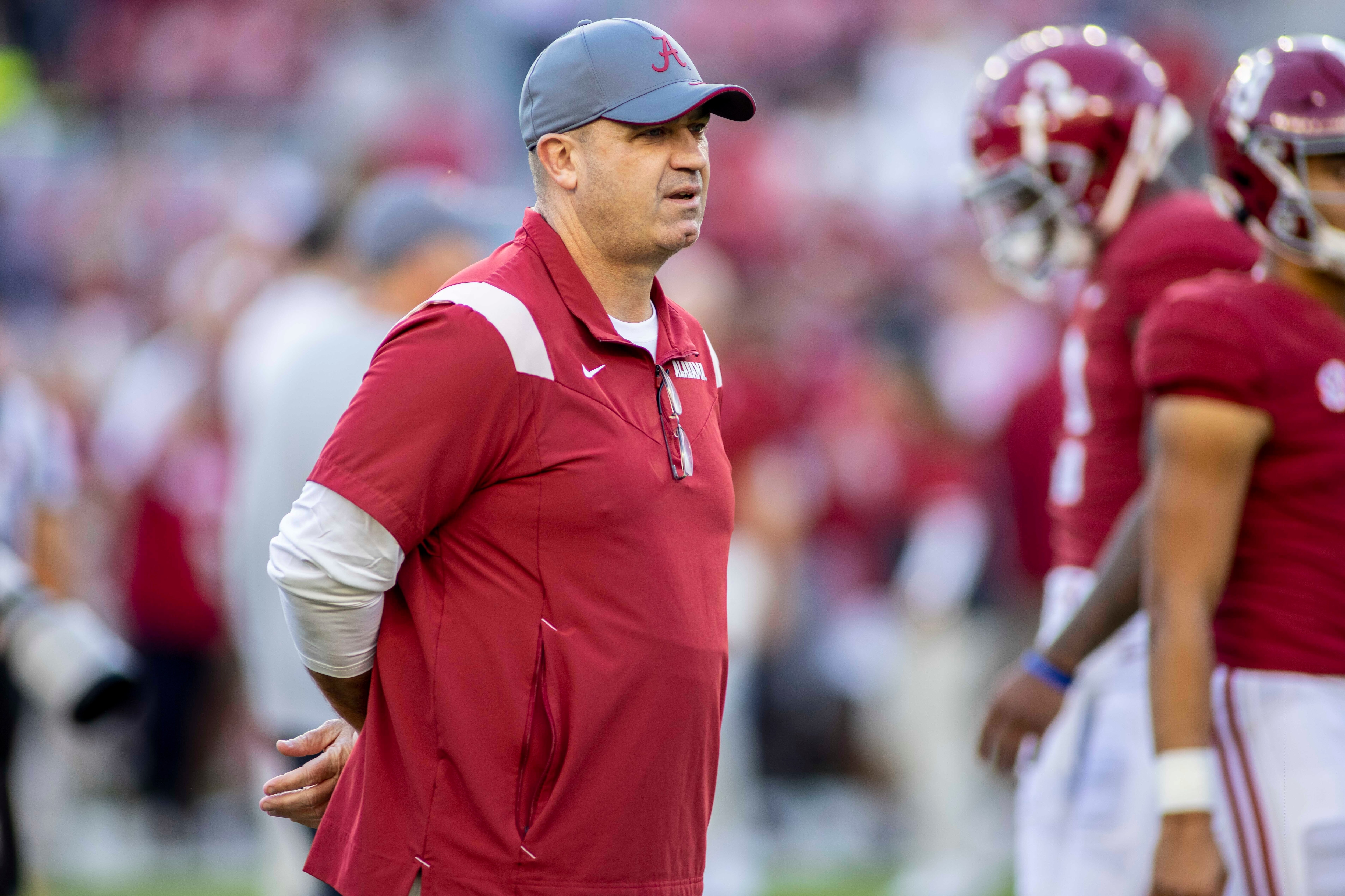 Alabama offensive coordinator Bill O'Brien watches Alabama warm up before an NCAA college football game against Tennessee, Saturday, Oct. 23, 2021, in Tuscaloosa, Ala. (AP Photo/Vasha Hunt)