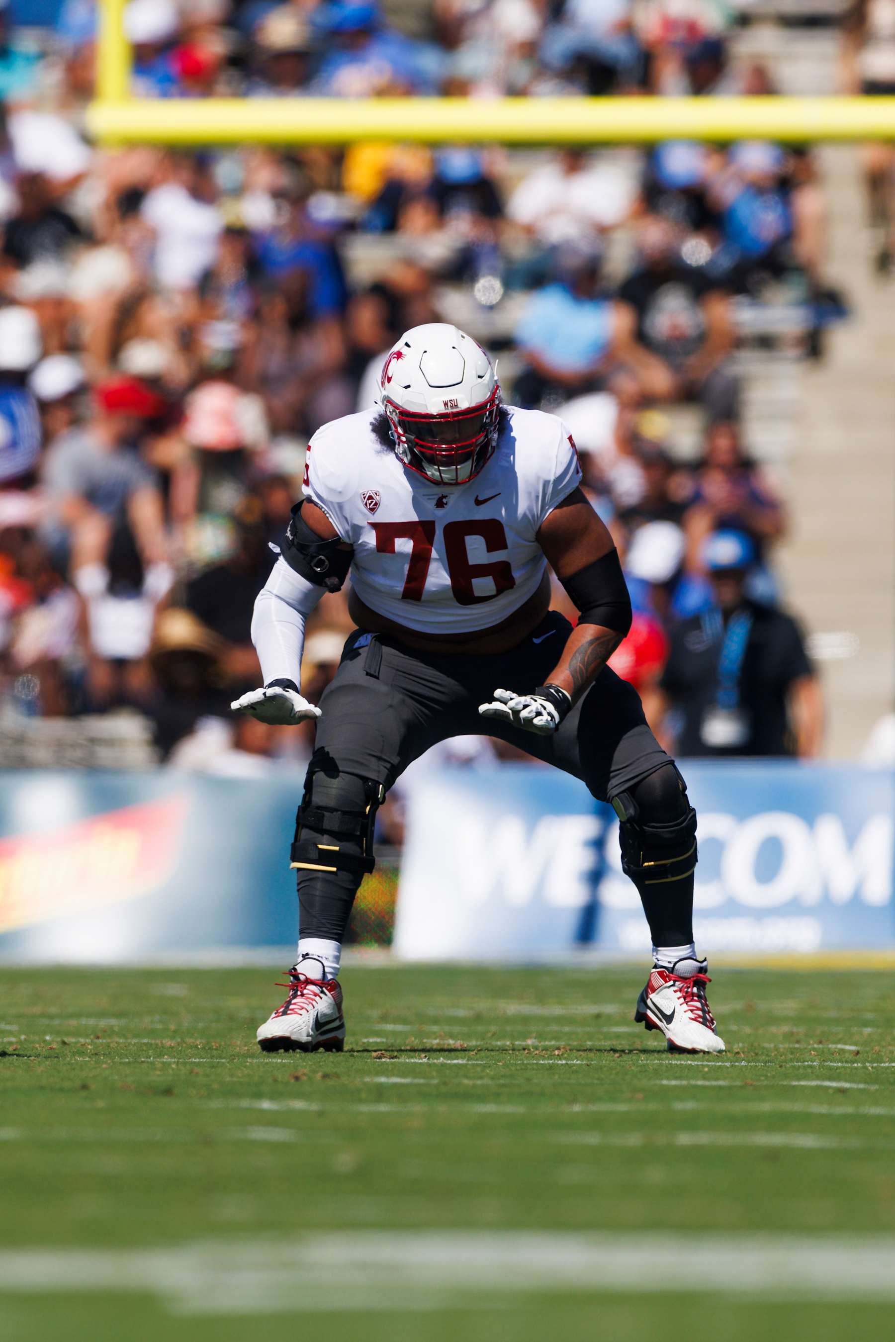 PASADENA, CA - OCTOBER 07: Washington State Cougars offensive lineman Esa Pole (76) blocks during the college football game against the UCLA Bruins on October 7, 2023 at Rose Bowl Stadium in Pasadena, CA. (Photo by Ric Tapia/Icon Sportswire via Getty Images)
