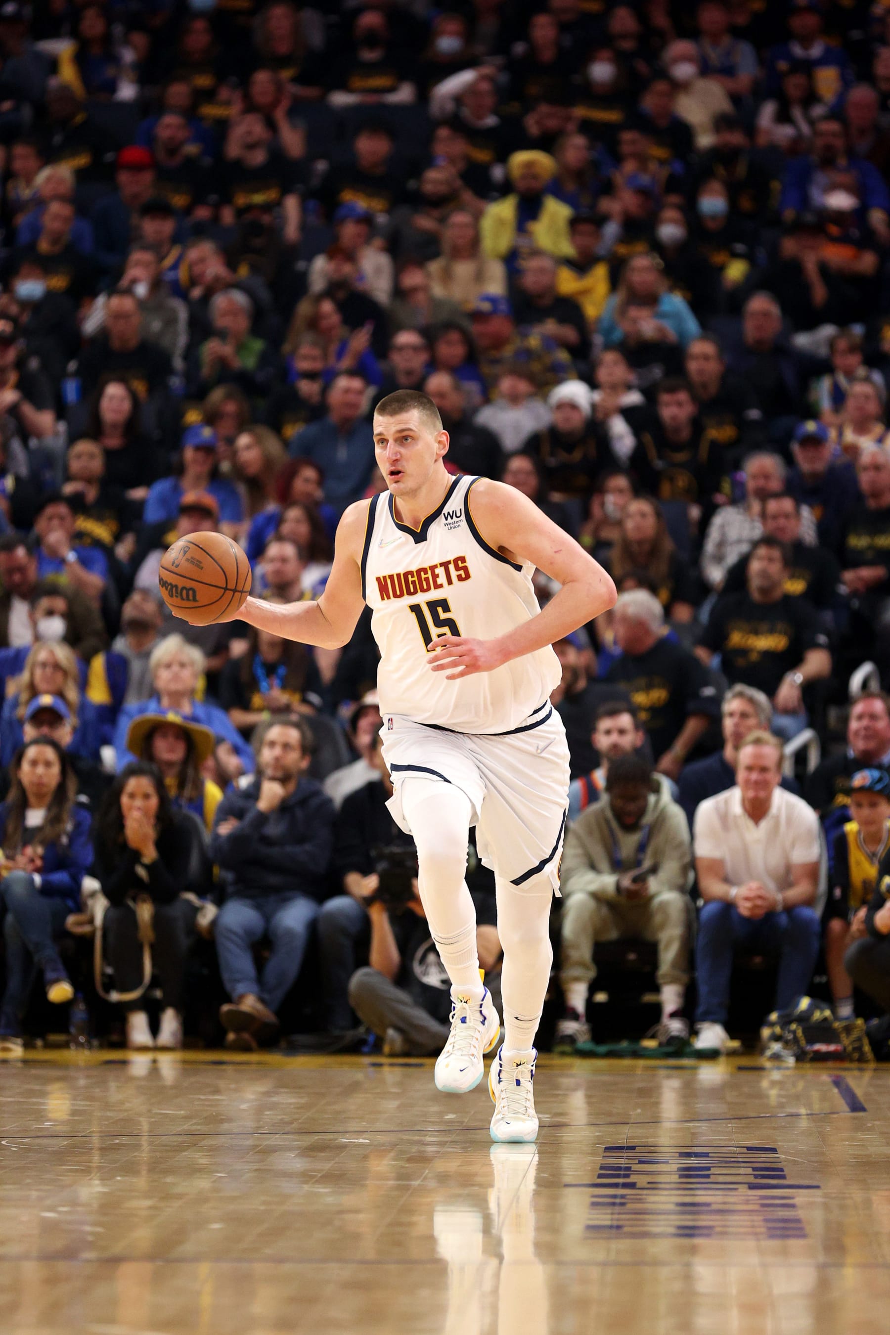 SAN FRANCISCO, CALIFORNIA - APRIL 27:  Nikola Jokic #15 of the Denver Nuggets in action against the Golden State Warriors during Game Five of the Western Conference First Round NBA Playoffs at Chase Center on April 27, 2022 in San Francisco, California. NOTE TO USER: User expressly acknowledges and agrees that, by downloading and/or using this photograph, User is consenting to the terms and conditions of the Getty Images License Agreement.  (Photo by Ezra Shaw/Getty Images)