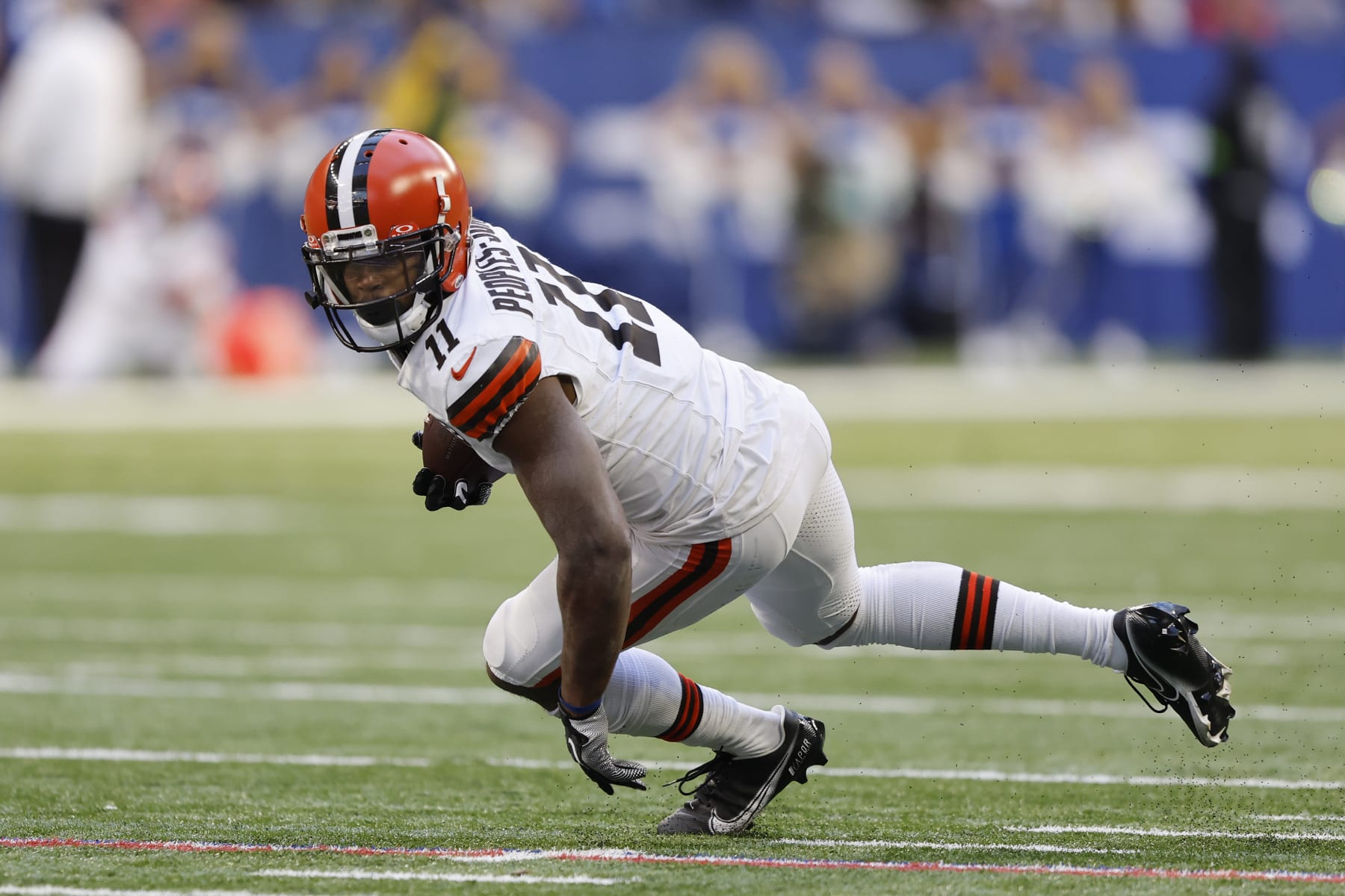 INDIANAPOLIS, IN - OCTOBER 22: Cleveland Browns wide receiver Donovan Peoples-Jones (11) looks up field after the catch during a NFL game between the Cleveland Browns and the Indianapolis Colts on October 22, 2023 at Lucas Oil Stadium in Indianapolis, IN.  (Photo by Jeffrey Brown/Icon Sportswire via Getty Images)