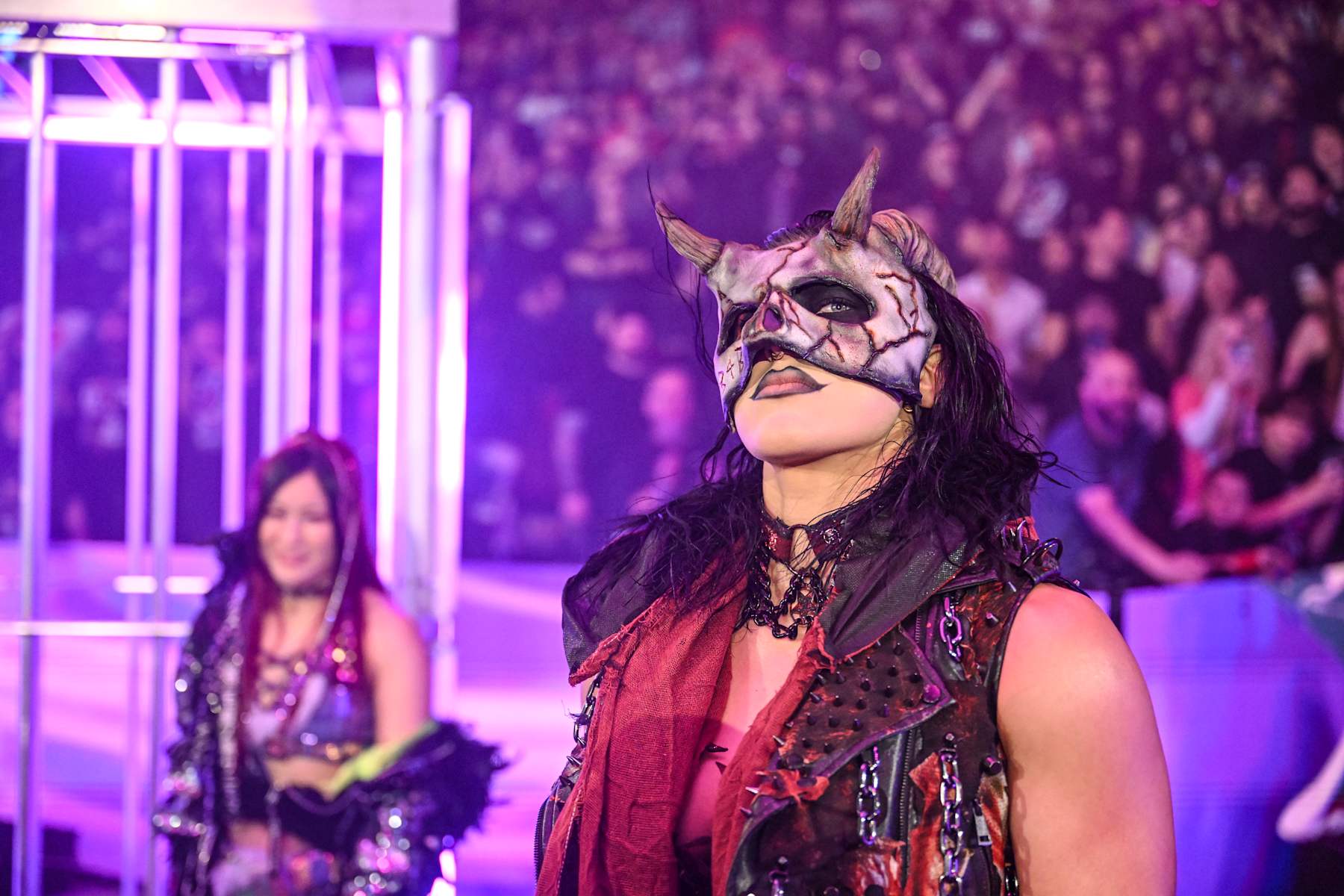 VANCOUVER, CANADA - NOVEMBER 30: Rhea Ripley makes her entrance during WWE Survivor Series: War Games at Rogers Arena on November 30, 2024 in Vancouver, Canada.  (Photo by WWE/Getty Images)