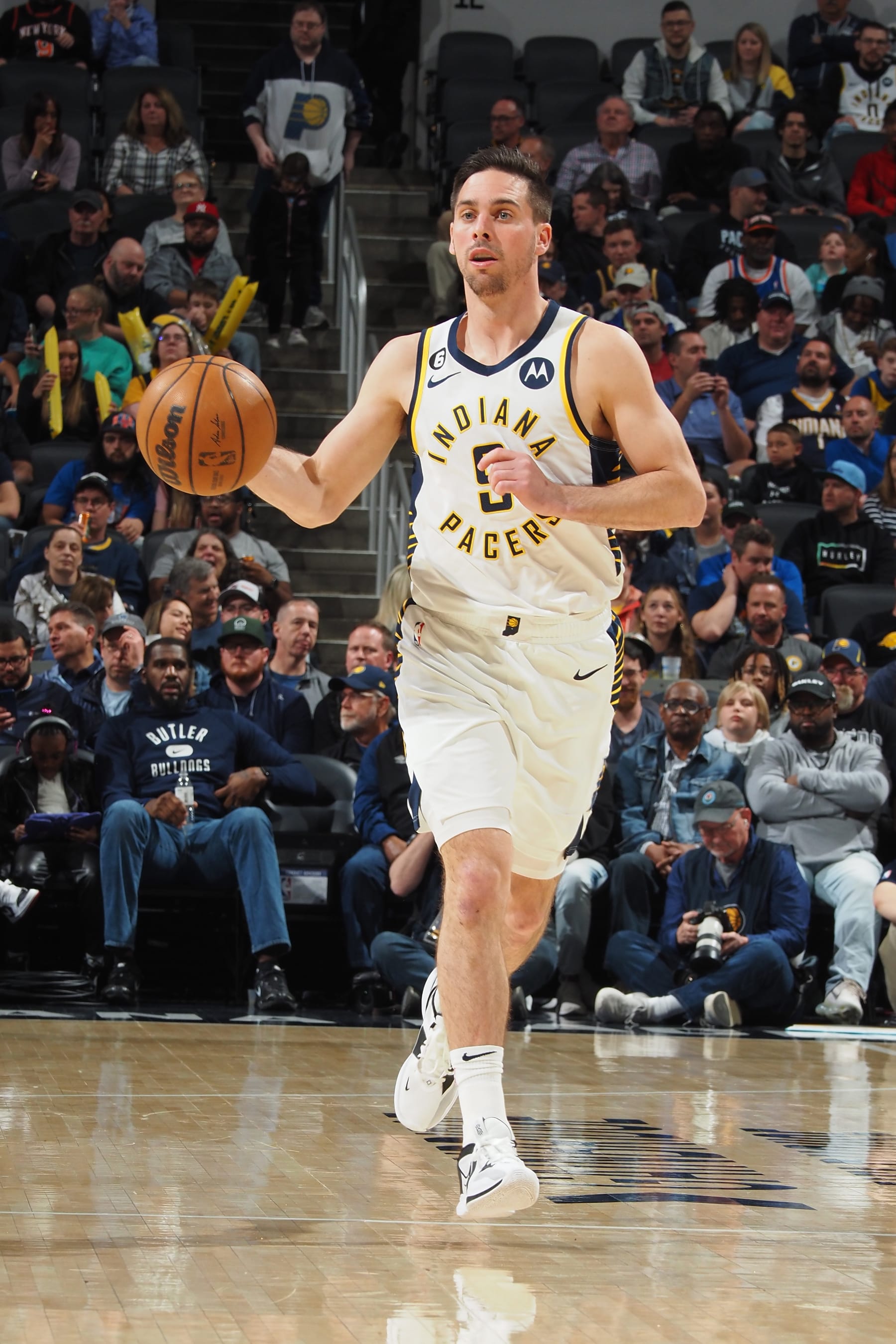 INDIANAPOLIS, IN - APRIL 5: T.J. McConnell #9 of the Indiana Pacers dribbles the ball during the game against the New York Knicks on April 5, 2023 at Gainbridge Fieldhouse in Indianapolis, Indiana. NOTE TO USER: User expressly acknowledges and agrees that, by downloading and or using this Photograph, user is consenting to the terms and conditions of the Getty Images License Agreement. Mandatory Copyright Notice: Copyright 2023 NBAE (Photo by Ron Hoskins/NBAE via Getty Images)