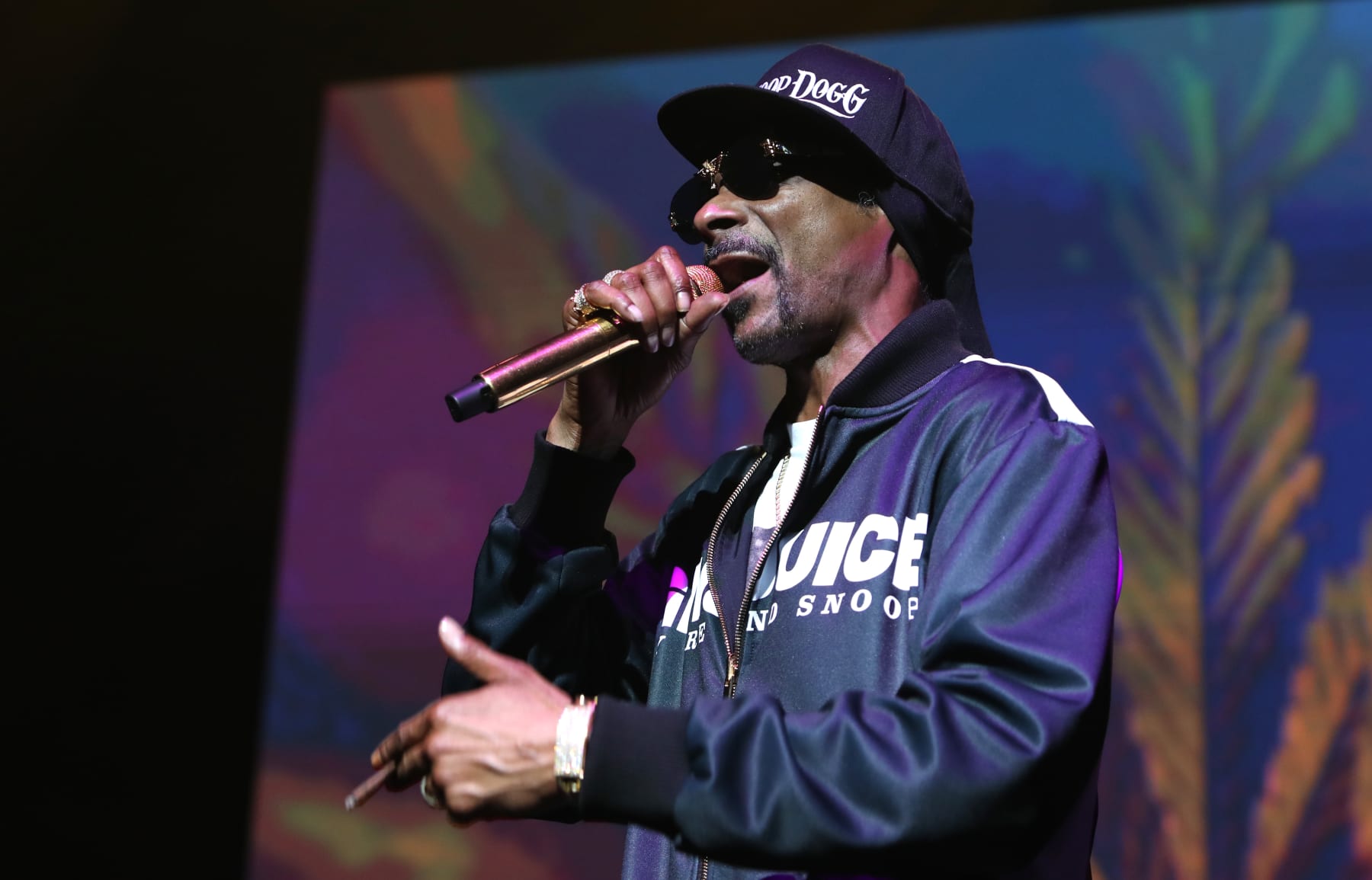 LOS ANGELES, CALIFORNIA - FEBRUARY 22: Snoop Dogg performs at Rhythm & Roast Event Presented By Cordell Broadus And Sharestix at The Novo on February 22, 2024 in Los Angeles, California. (Photo by Cassidy Sparrow/Getty Images for or CORDELL BROADUS & SHARESTIX )