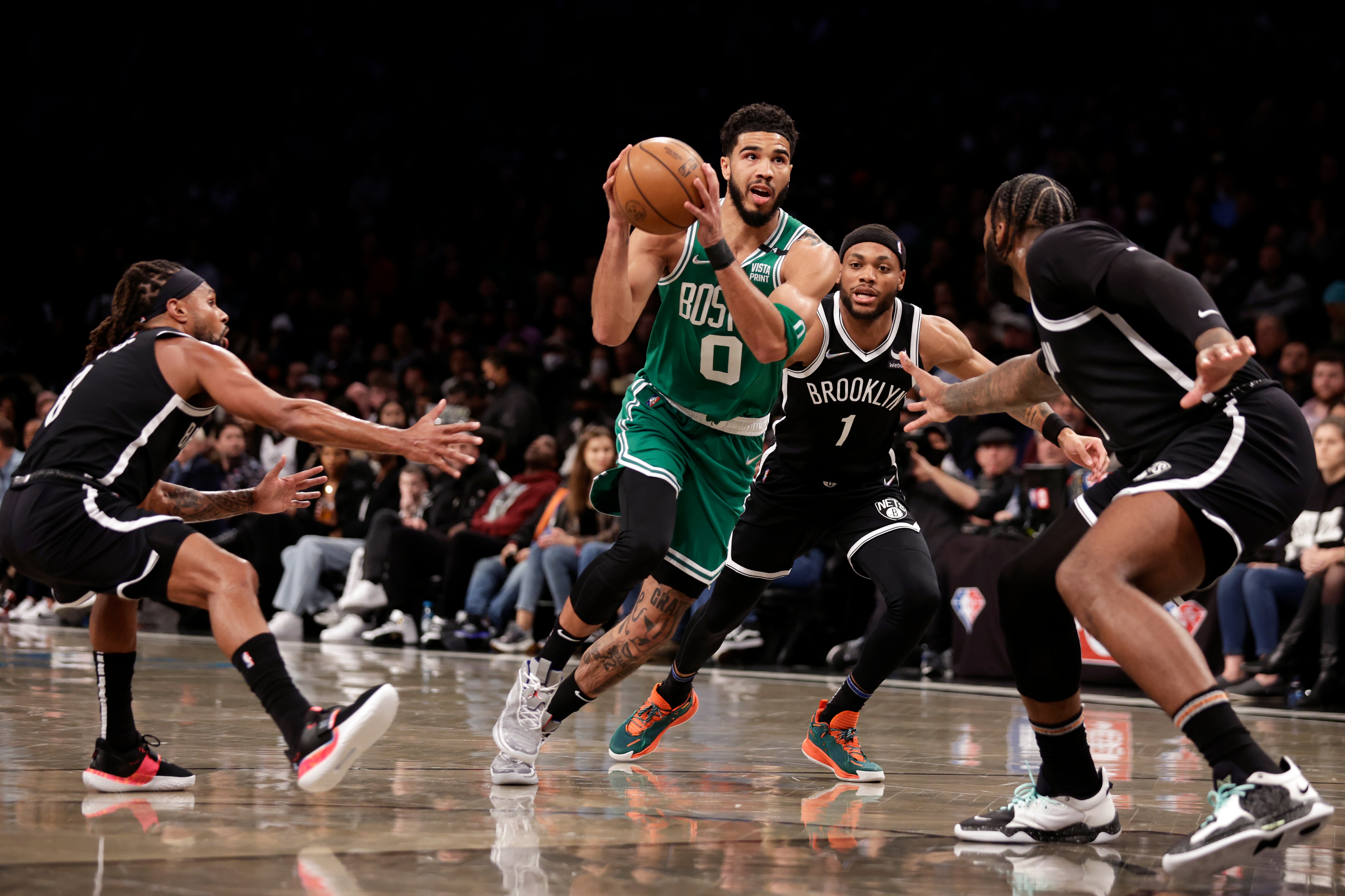 NEW YORK, NEW YORK - FEBRUARY 24: Jayson Tatum #0 of the Boston Celtics drives to the basket past Bruce Brown #1 of the Brooklyn Nets during the first half at Barclays Center on February 24, 2022 in New York City. NOTE TO USER: User expressly acknowledges and agrees that, by downloading and or using this Photograph, user is consenting to the terms and conditions of the Getty Images License Agreement. (Photo by Adam Hunger/Getty Images)