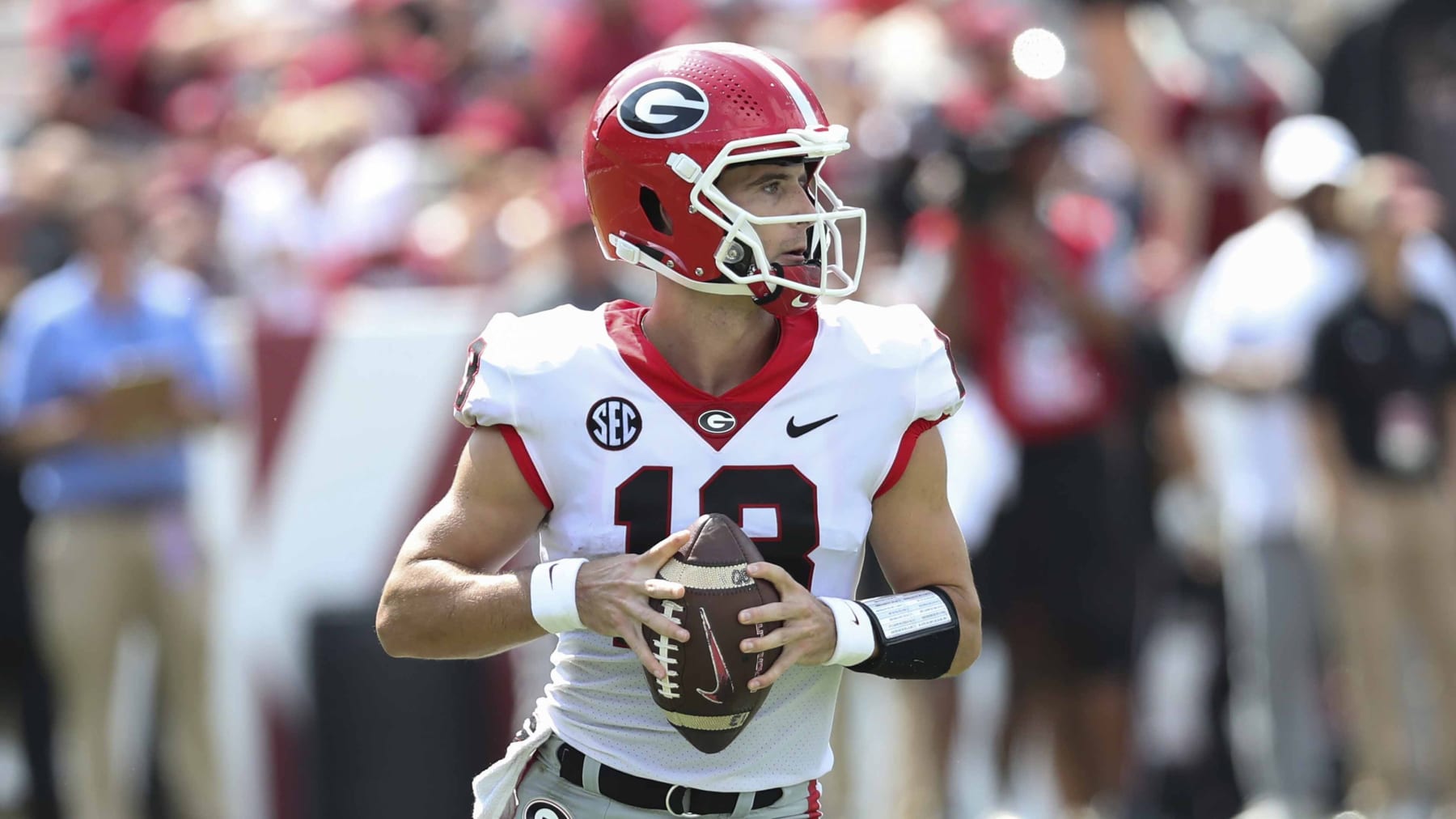 Georgia quarterback Stetson Bennett (13) drops back to pass during an NCAA college football game against South Carolina on Saturday, Sept. 17, 2022 in Columbia, S.C. (AP Photo/Artie Walker Jr.)