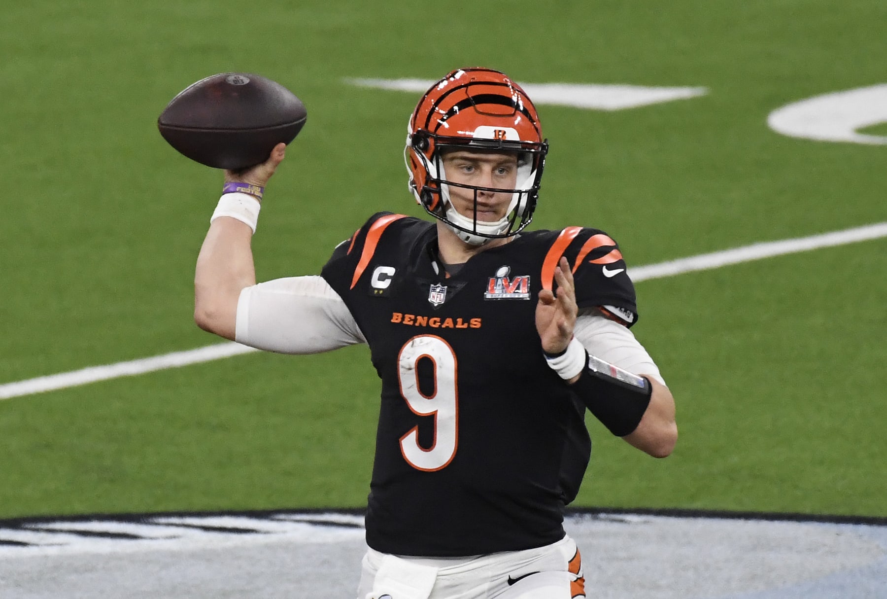 INGLEWOOD, CALIFORNIA - FEBRUARY 13: Joe Burrow #9 of the Cincinnati Bengals looks to pass against the Los Angeles Rams during Super Bowl LVI at SoFi Stadium on February 13, 2022 in Inglewood, California. (Photo by Focus on Sport/Getty Images)