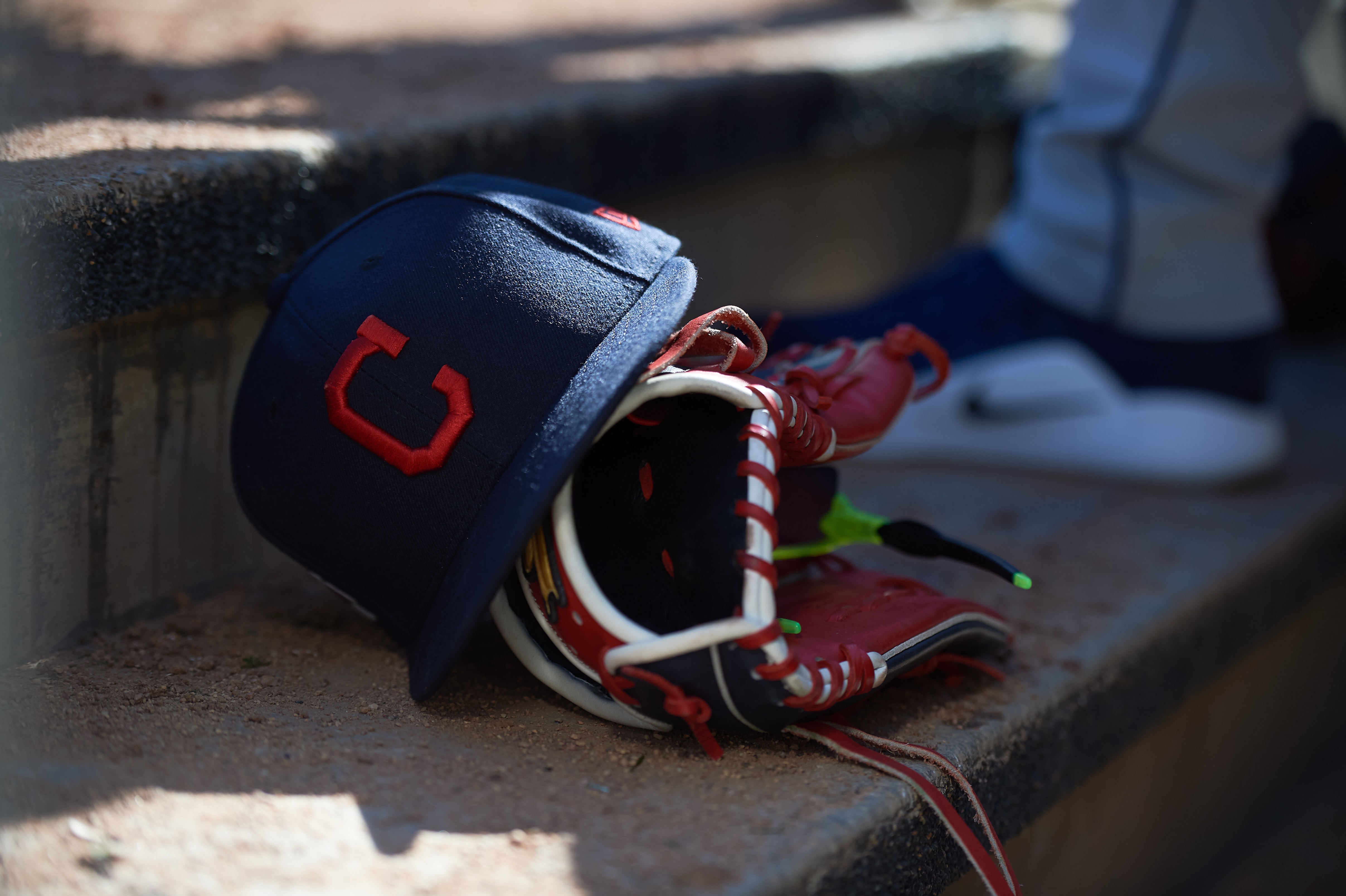 MINNEAPOLIS, MN - MARCH 30: A Cleveland Indians hat and glove are seen during the game between the Minnesota Twins and the Cleveland Indians on March 30, 2019 at Target Field in Minneapolis, Minnesota. The Indians defeated the Twins 2-1. (Photo by Hannah Foslien/Getty Images)