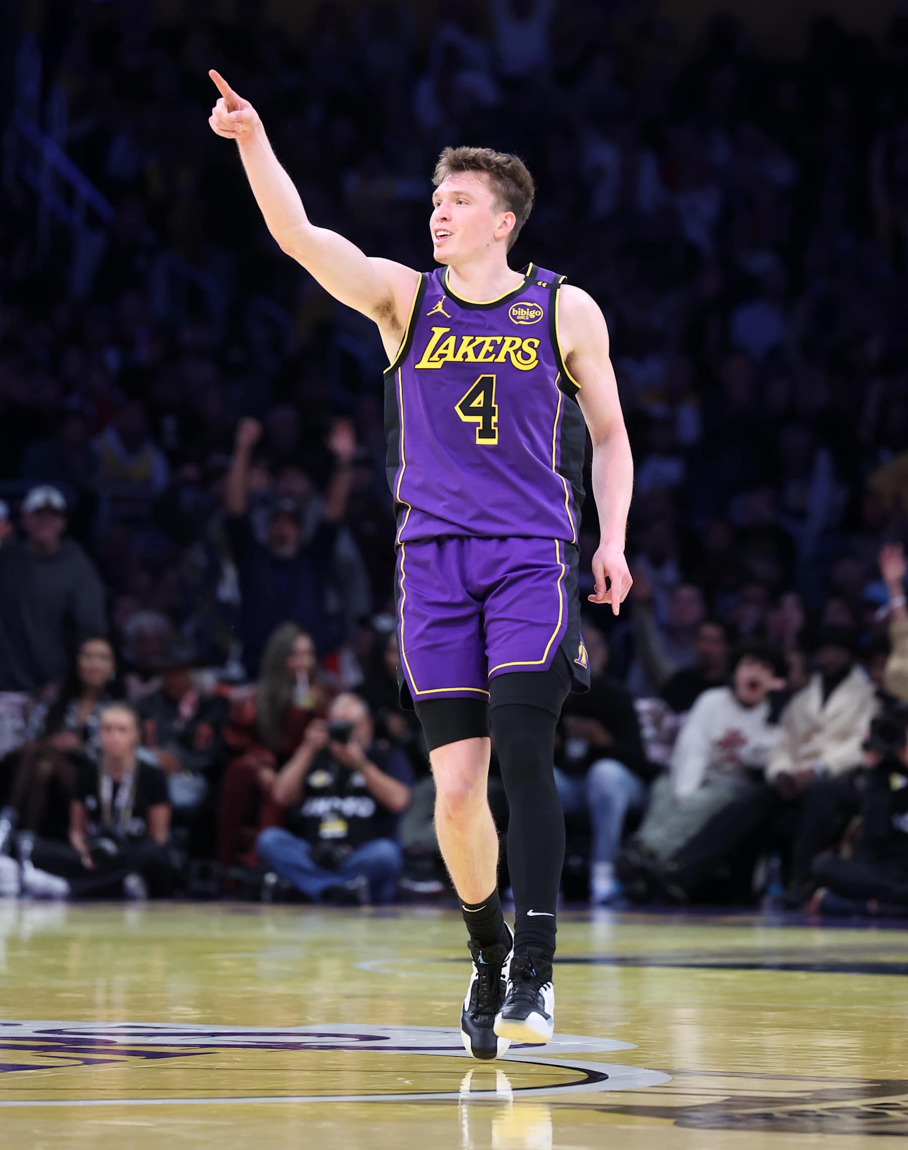 Los Angeles, California November 19, 2024-Lakers Dalton Knecht celebrates his three-pointer against the Jazz in the second half at Crypto.com Arena Tuesday. (Wally Skalij/Los Angeles Times via Getty Images)