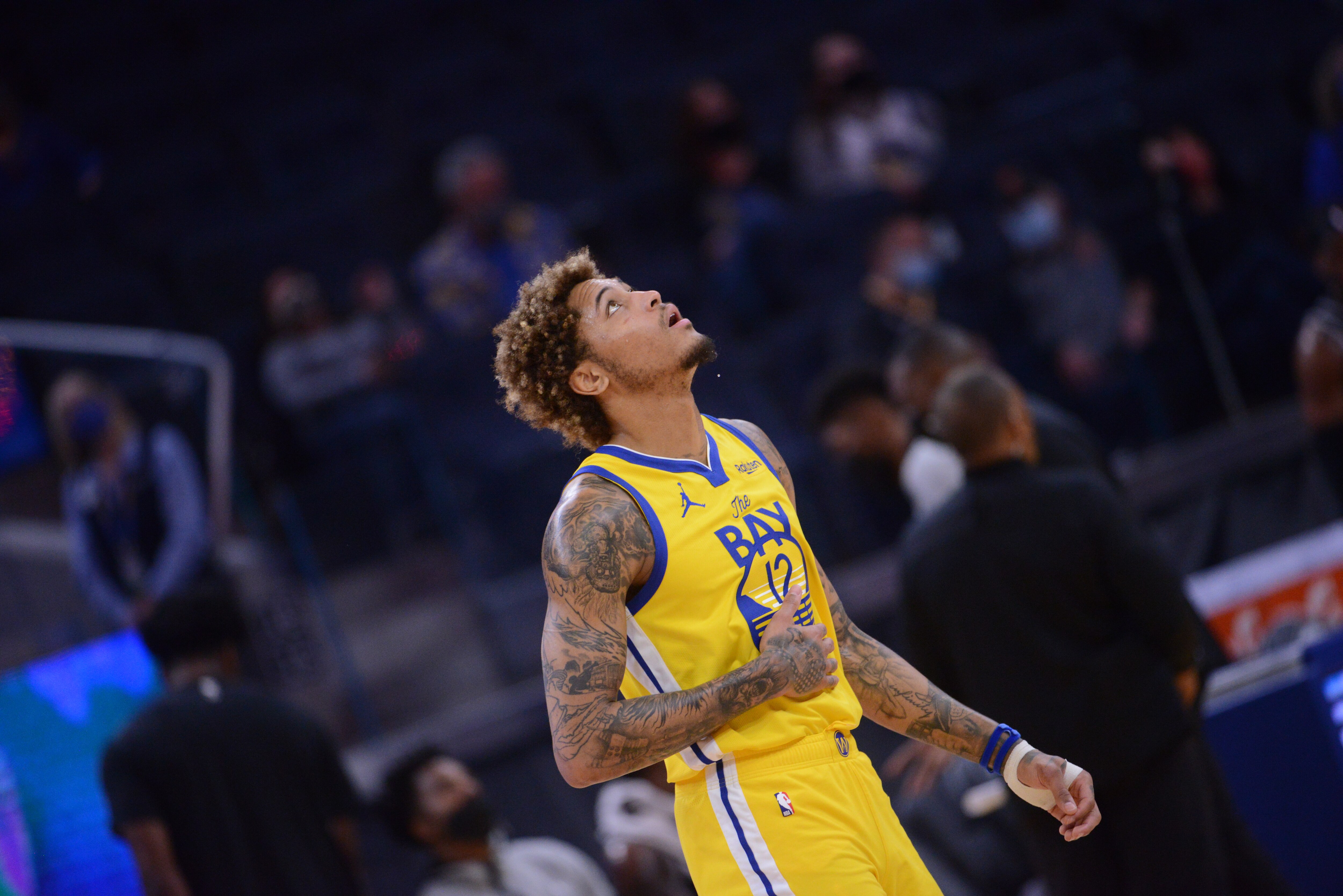 SAN FRANCISCO, CA - APRIL 25: Kelly Oubre Jr. #12 of the Golden State Warriors looks on during the game against the Sacramento Kings on April 25, 2021 at Chase Center in San Francisco, California. NOTE TO USER: User expressly acknowledges and agrees that, by downloading and or using this photograph, user is consenting to the terms and conditions of Getty Images License Agreement. Mandatory Copyright Notice: Copyright 2021 NBAE (Photo by Noah Graham/NBAE via Getty Images)
