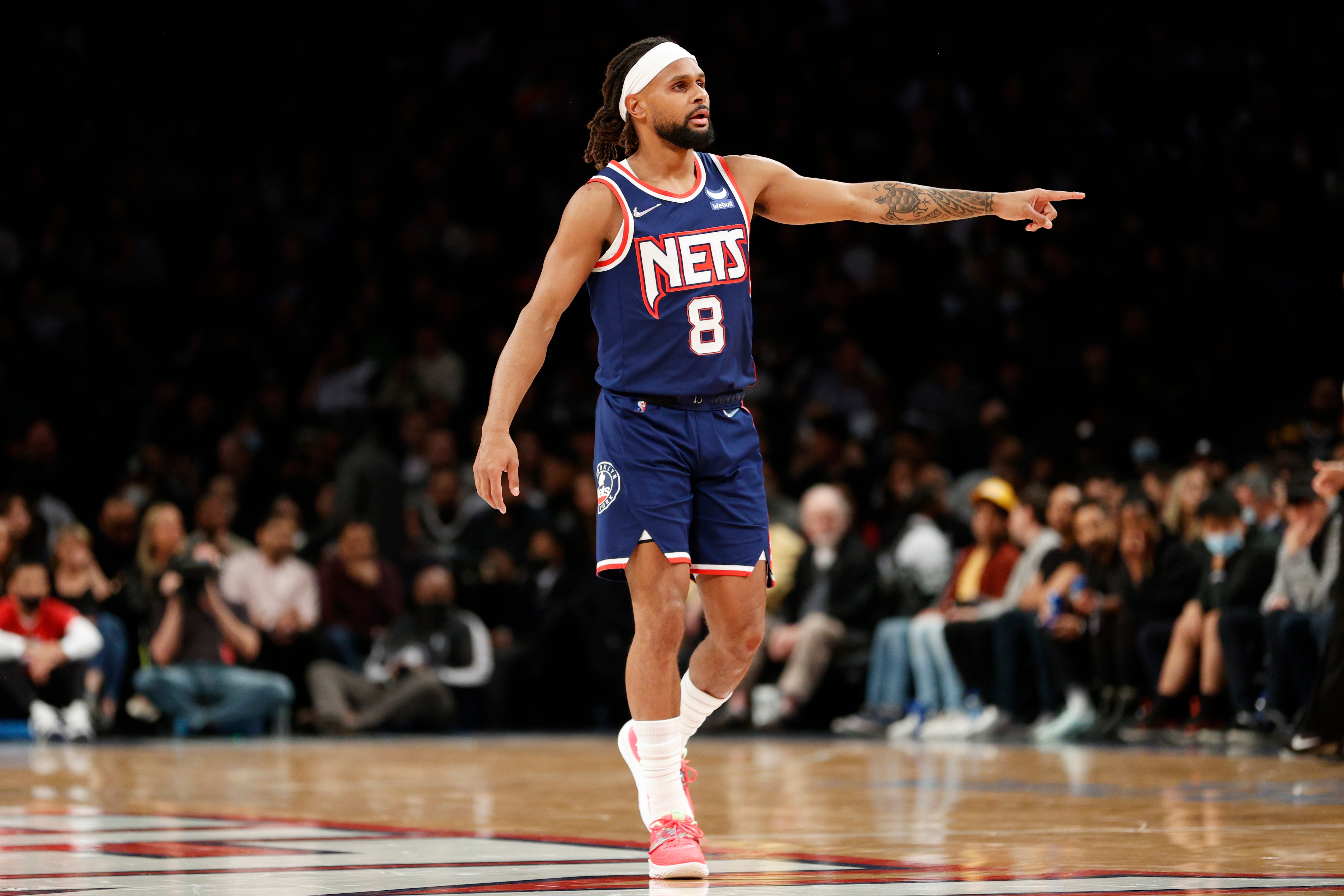 NEW YORK, NEW YORK - APRIL 08: Patty Mills #8 of the Brooklyn Nets looks on during the first half against the Cleveland Cavaliers at Barclays Center on April 08, 2022 in the Brooklyn borough of New York City. NOTE TO USER: User expressly acknowledges and agrees that, by downloading and or using this photograph, User is consenting to the terms and conditions of the Getty Images License Agreement. (Photo by Sarah Stier/Getty Images)