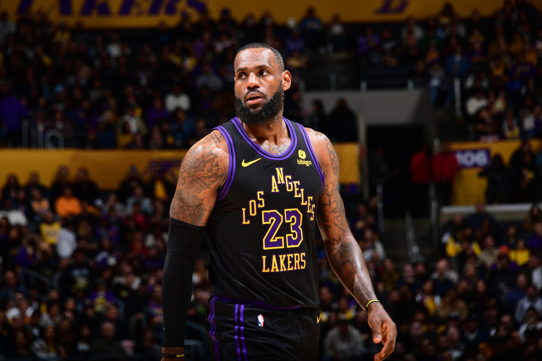 LOS ANGELES, CA - JANUARY 9: LeBron James #23 of the Los Angeles Lakers looks on during the game against the Toronto Raptors on January 9, 2024 at Crypto.Com Arena in Los Angeles, California. NOTE TO USER: User expressly acknowledges and agrees that, by downloading and/or using this Photograph, user is consenting to the terms and conditions of the Getty Images License Agreement. Mandatory Copyright Notice: Copyright 2024 NBAE (Photo by Adam Pantozzi/NBAE via Getty Images)