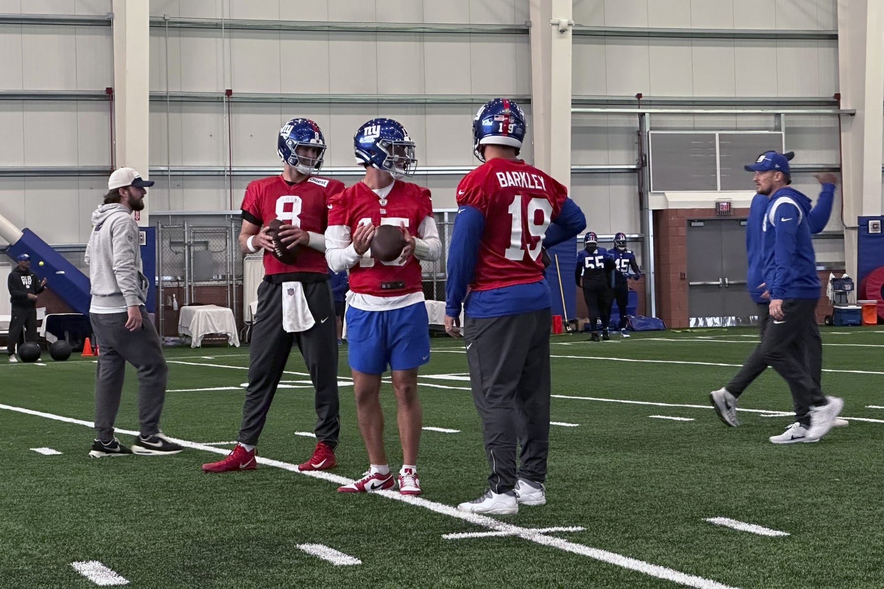 New York Giants' Daniel Jones (8), Tommy DeVito (15) and Matt Barkley (19) talk during NFL football practice in East Rutherford, N.J., Wednesday, Nov. 1, 2023. (AP Photo/Tom Canavan) New York Giants' Daniel Jones (8), Tommy DeVito (15) and Matt Barkley (19) talk during NFL football practice in East Rutherford, N.J., Wednesday, Nov. 1, 2023. (AP Photo/Tom Canavan)