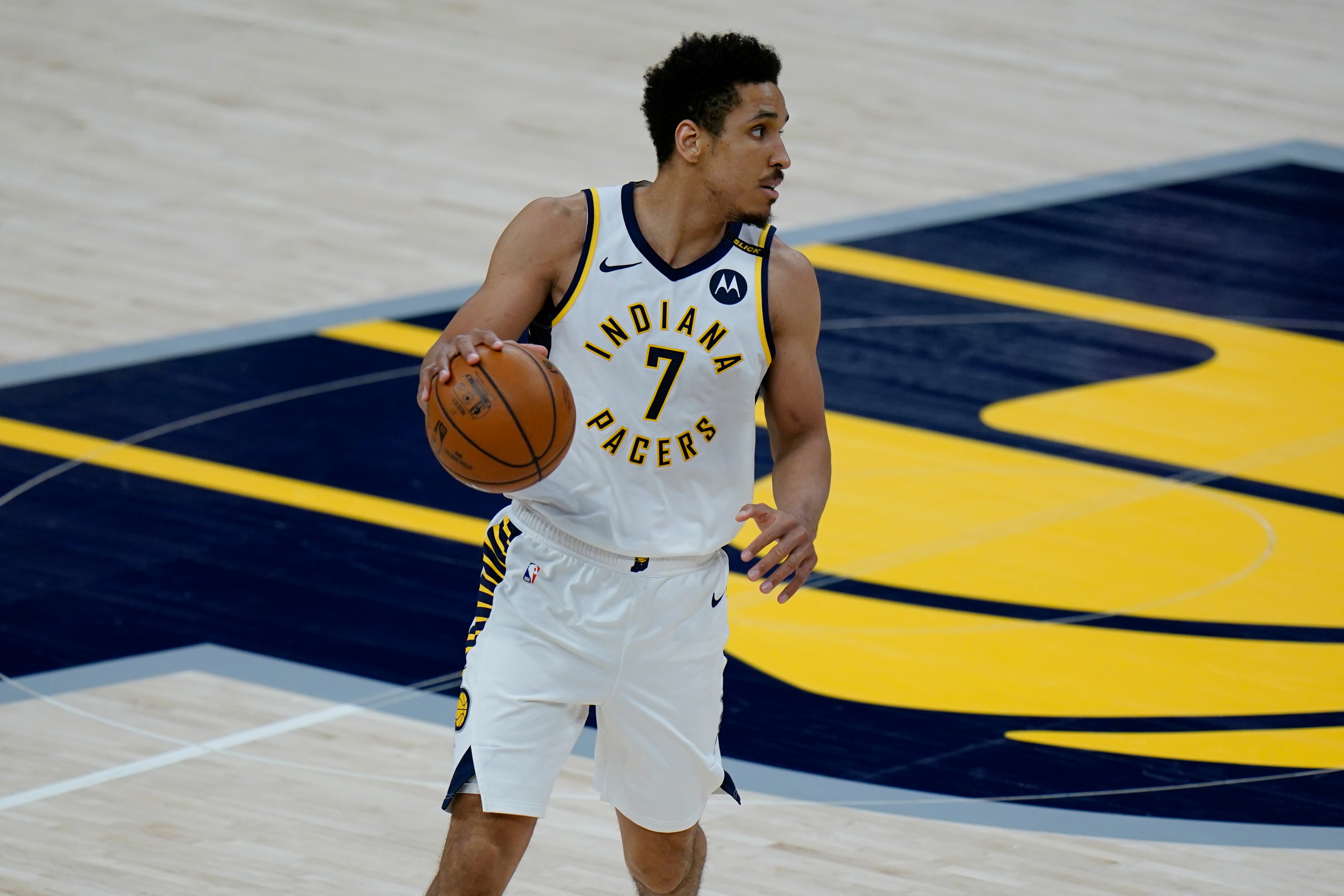 Indiana Pacers guard Malcolm Brogdon (7) in action as the Portland Trail Blazers played the Indiana Pacers in an NBA basketball game in Indianapolis, Tuesday, April 27, 2021. (AP Photo/AJ Mast)