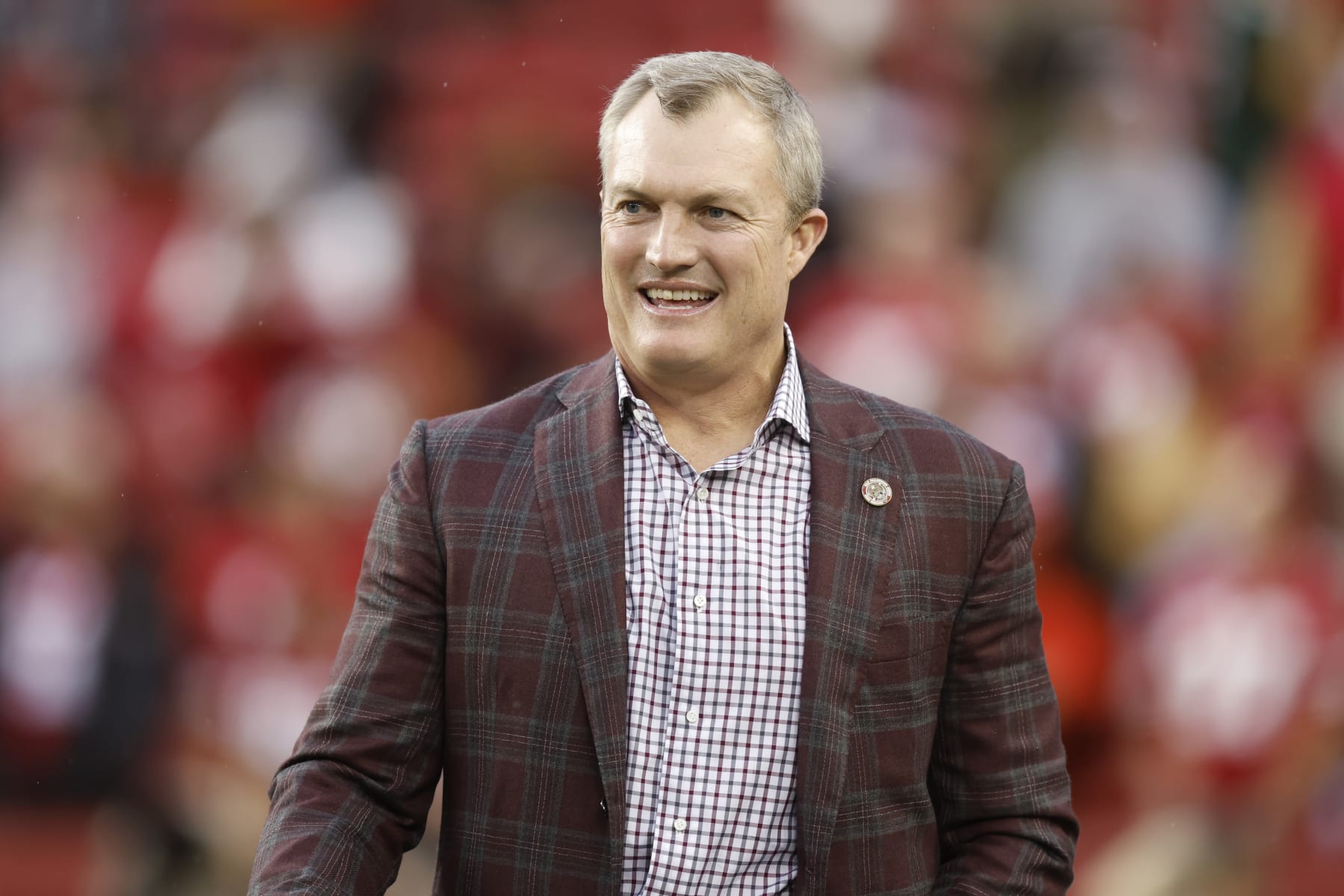 SANTA CLARA, CALIFORNIA - JANUARY 20: San Francisco 49ers general manager John Lynch looks on before the NFC Divisional Playoffs between the Green Bay Packers and the San Francisco 49ers at Levi's Stadium on January 20, 2024 in Santa Clara, California. (Photo by Lachlan Cunningham/Getty Images)