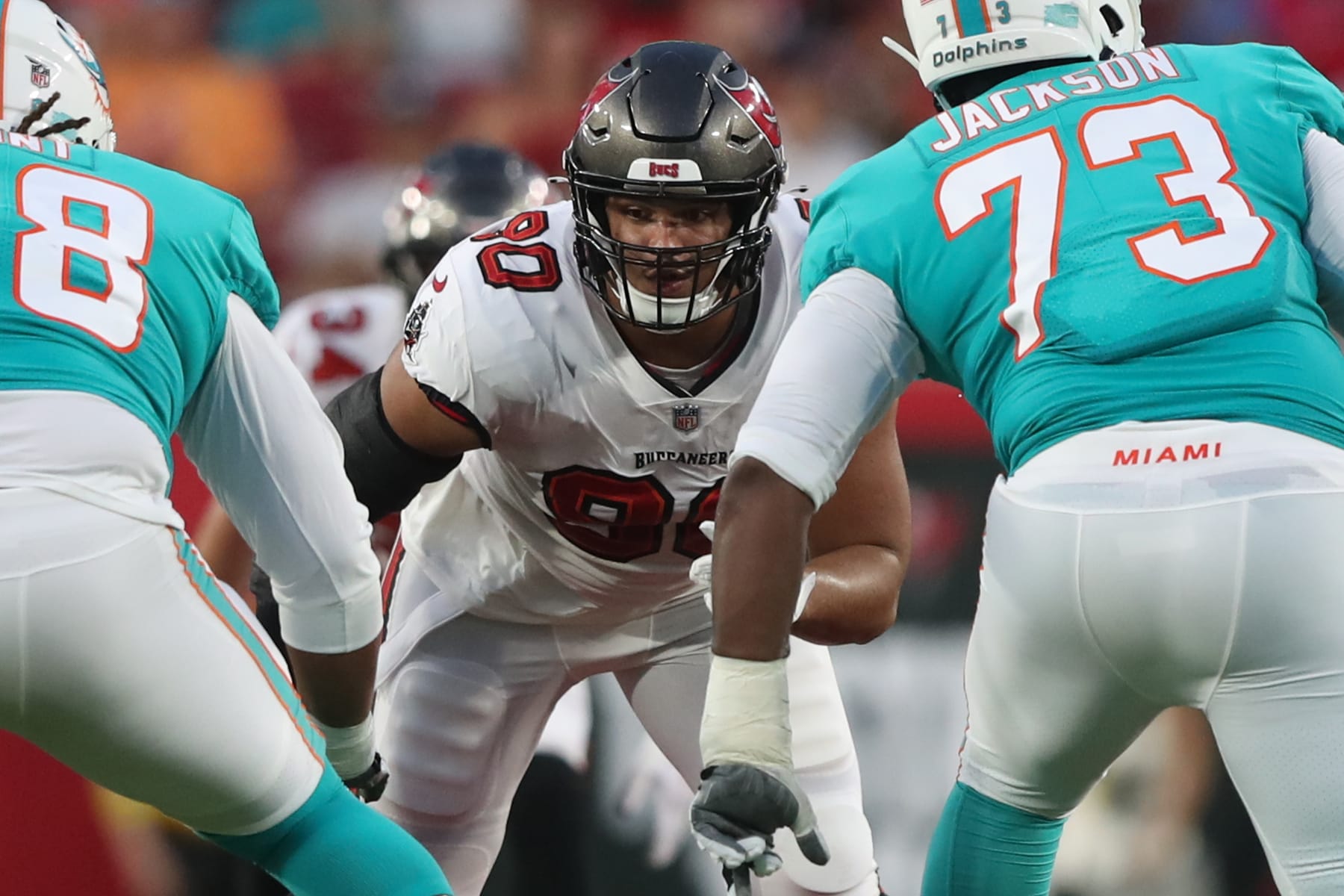 TAMPA, FL - AUGUST 13: Tampa Bay Buccaneers defensive lineman Logan Hall (90) rushes the passer during the preseason game between the Miami Dolphins and the Tampa Bay Buccaneers on August 13, 2022 at Raymond James Stadium in Tampa, Florida. (Photo by Cliff Welch/Icon Sportswire via Getty Images)