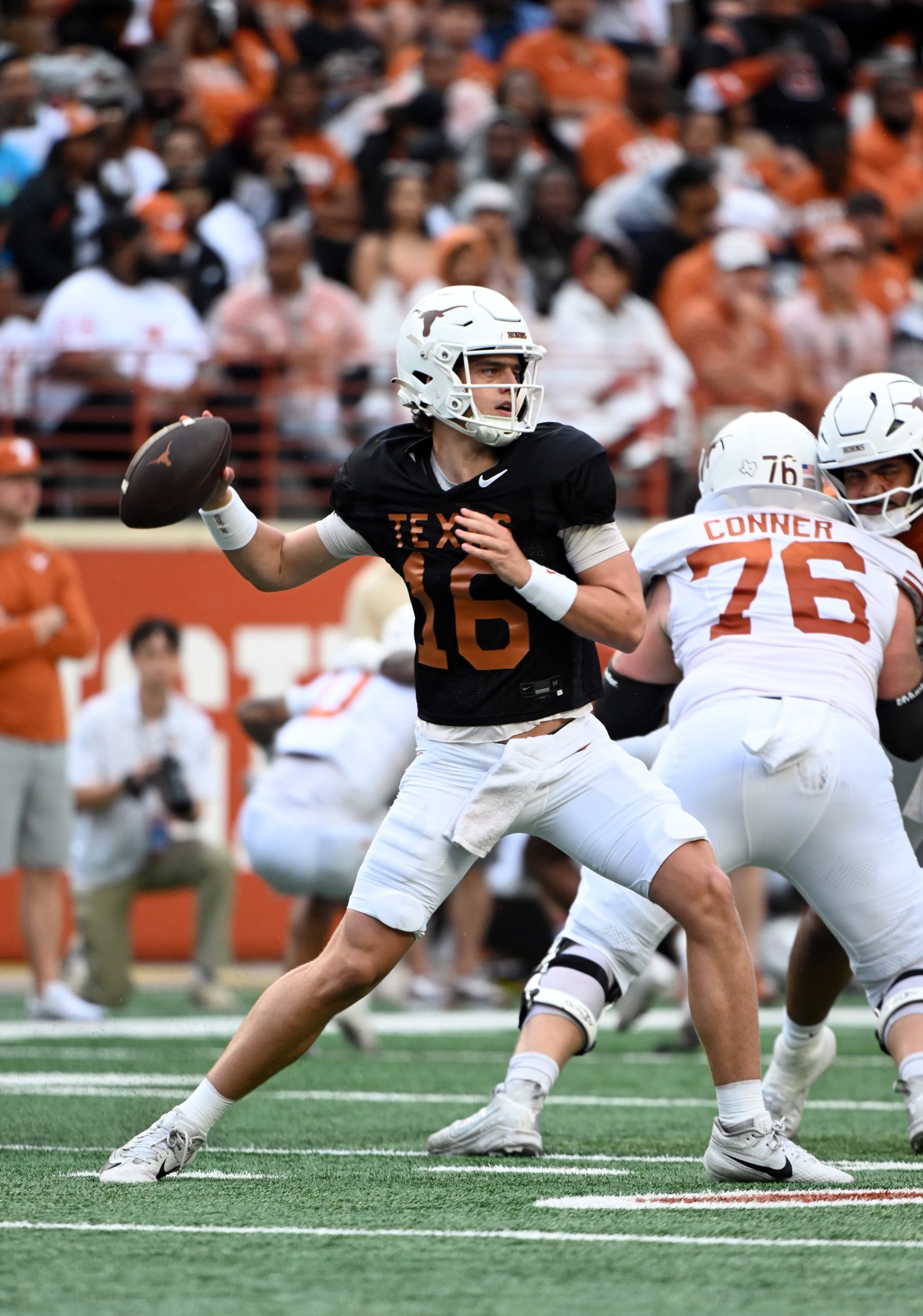 AUSTIN, TX - APRIL 20: Texas Longhorns QB Arch Manning throws a pass during the Orange-White spring game on April 20, 2024, at Darrell K Royal-Texas Memorial Stadium in Austin, TX. (Photo by John Rivera/Icon Sportswire via Getty Images)