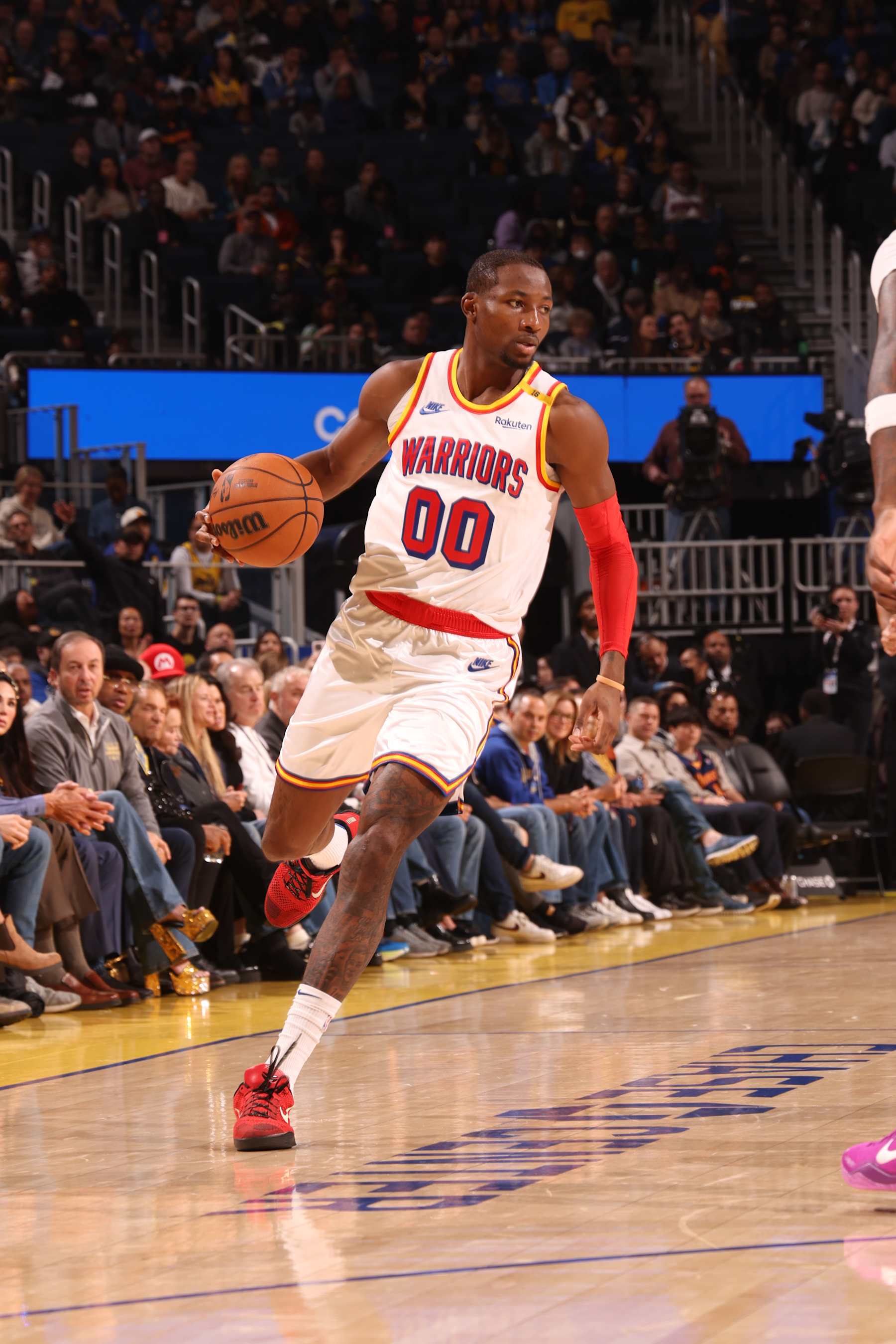 SAN FRANCISCO, CA - DECEMBER 8: Jonathan Kuminga #00 of the Golden State Warriors dribbles the ball during the game against the Minnesota Timberwolves on October 22, 2024 at Chase Center in San Francisco, California. NOTE TO USER: User expressly acknowledges and agrees that, by downloading and or using this photograph, user is consenting to the terms and conditions of Getty Images License Agreement. Mandatory Copyright Notice: Copyright 2024 NBAE (Photo by Jed Jacobsohn/NBAE via Getty Images)