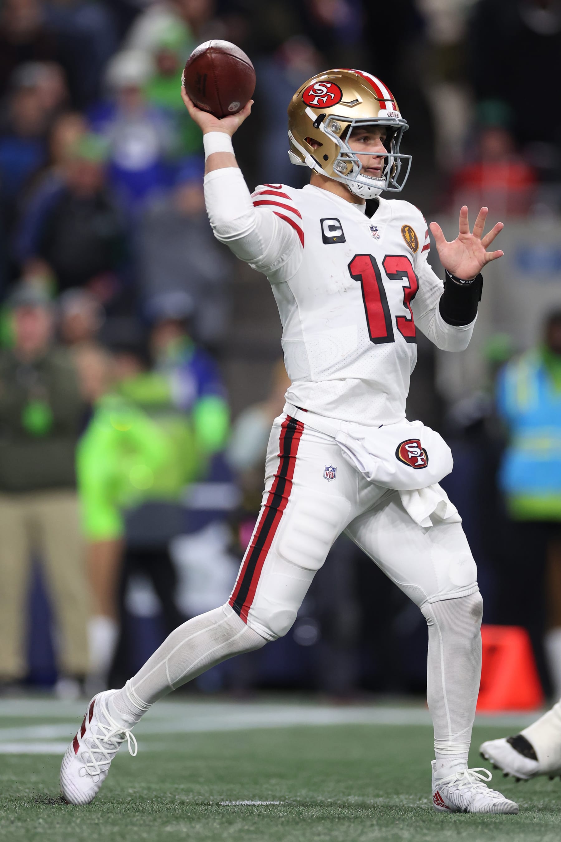 SEATTLE, WASHINGTON - NOVEMBER 23: Brock Purdy #13 of the San Francisco 49ers throws a pass during the third quarter against the Seattle Seahawks at Lumen Field on November 23, 2023 in Seattle, Washington. (Photo by Steph Chambers/Getty Images)