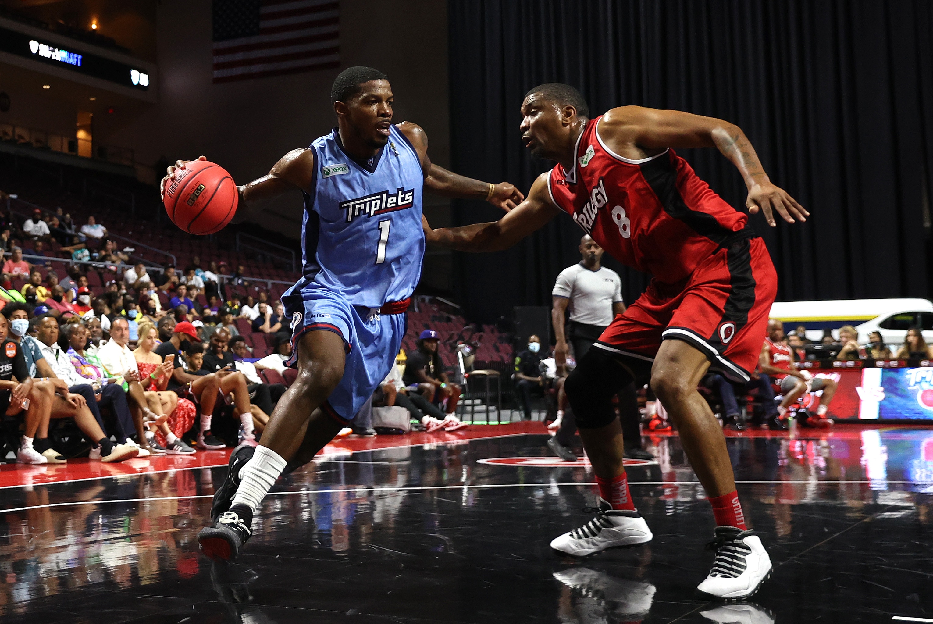 LAS VEGAS, NEVADA - JULY 24: Joe Johnson #1 of Triplets drives to the basket against James White #8 of Trilogy during week three of the BIG3 at the Orleans Arena on July 24, 2021 in Las Vegas, Nevada. (Photo by Ronald Martinez/Getty Images)