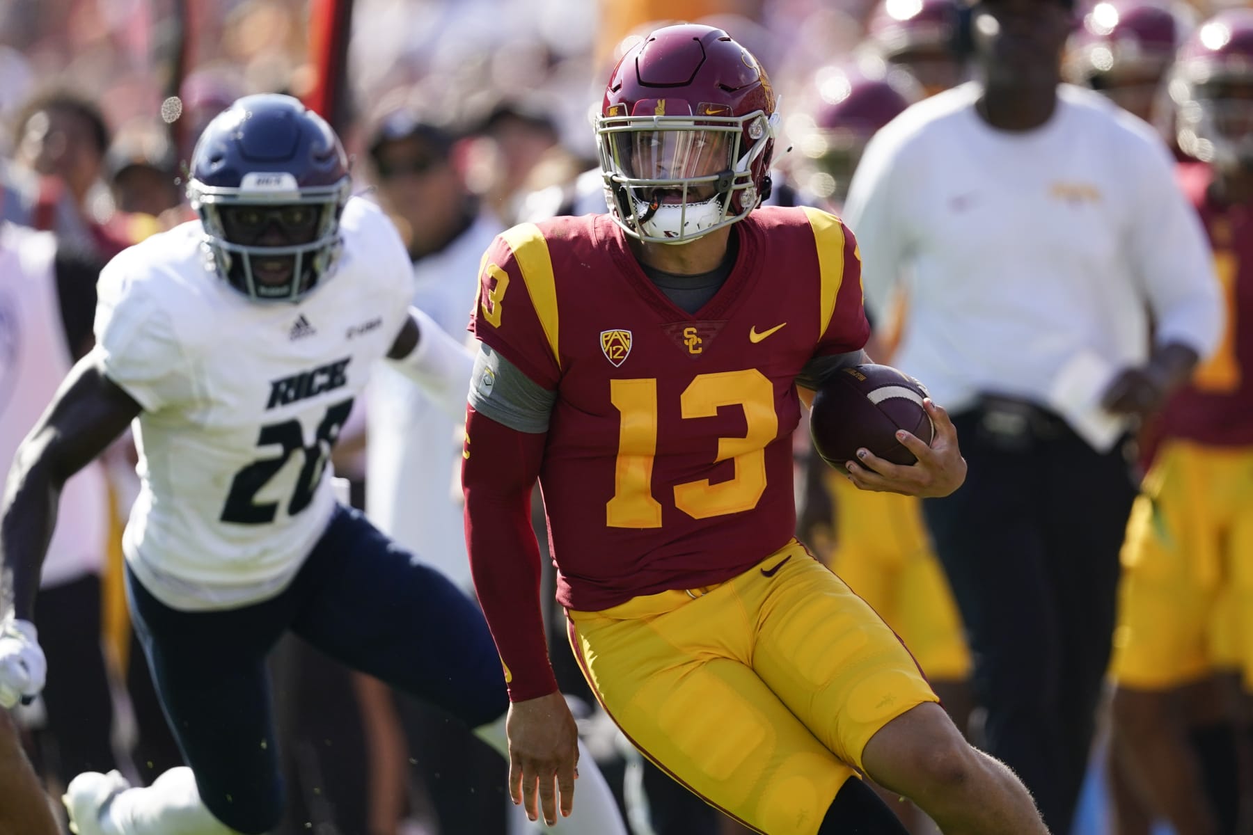 Southern California quarterback Caleb Williams (13) runs the ball during the first half of an NCAA college football game against Rice in Los Angeles, Saturday, Sept. 3, 2022. (AP Photo/Ashley Landis)