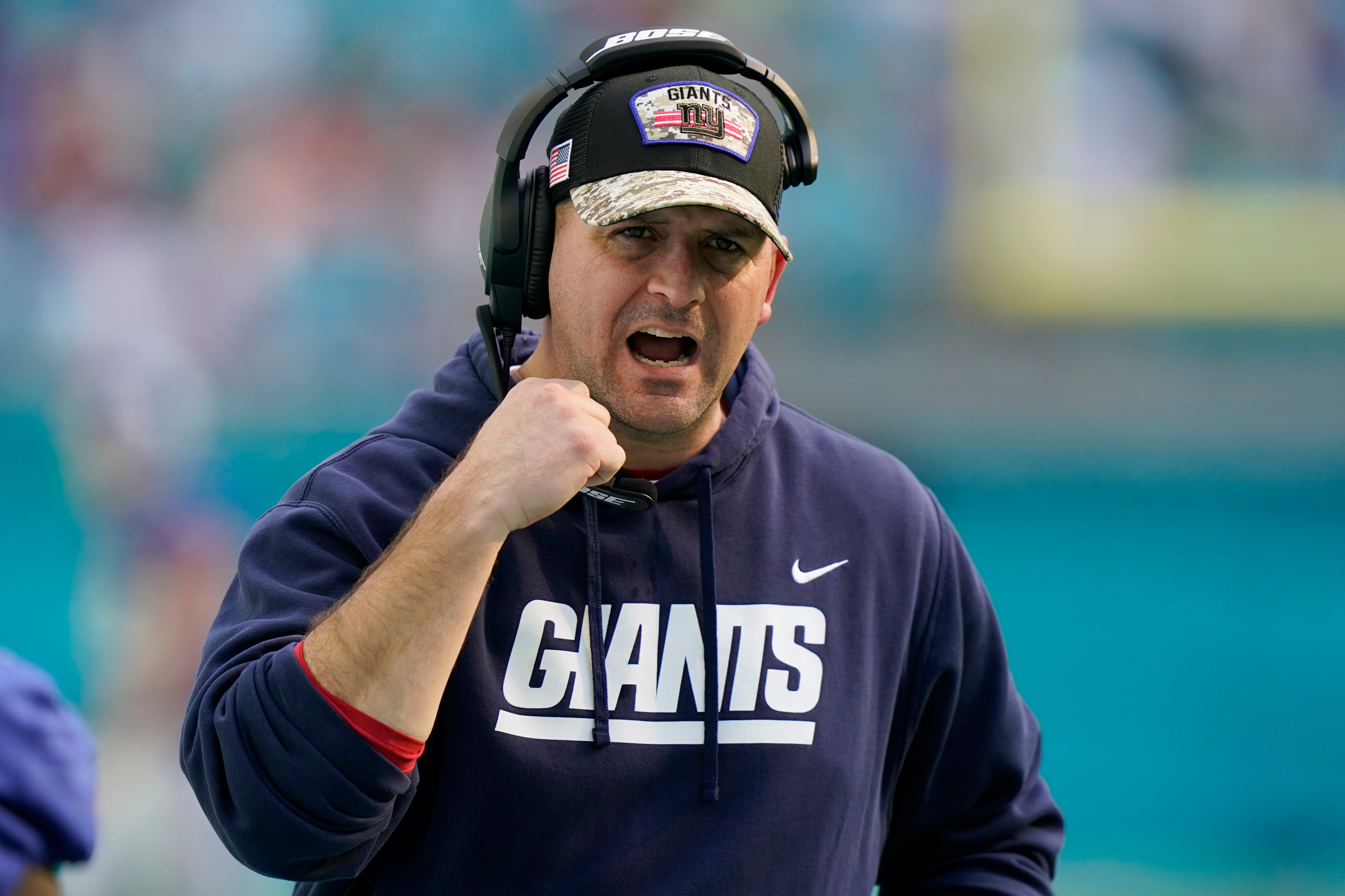 New York Giants head coach Joe Judge gestures during the second half of an NFL football game against the Miami Dolphins, Sunday, Dec. 5, 2021, in Miami Gardens, Fla. (AP Photo/Lynne Sladky)