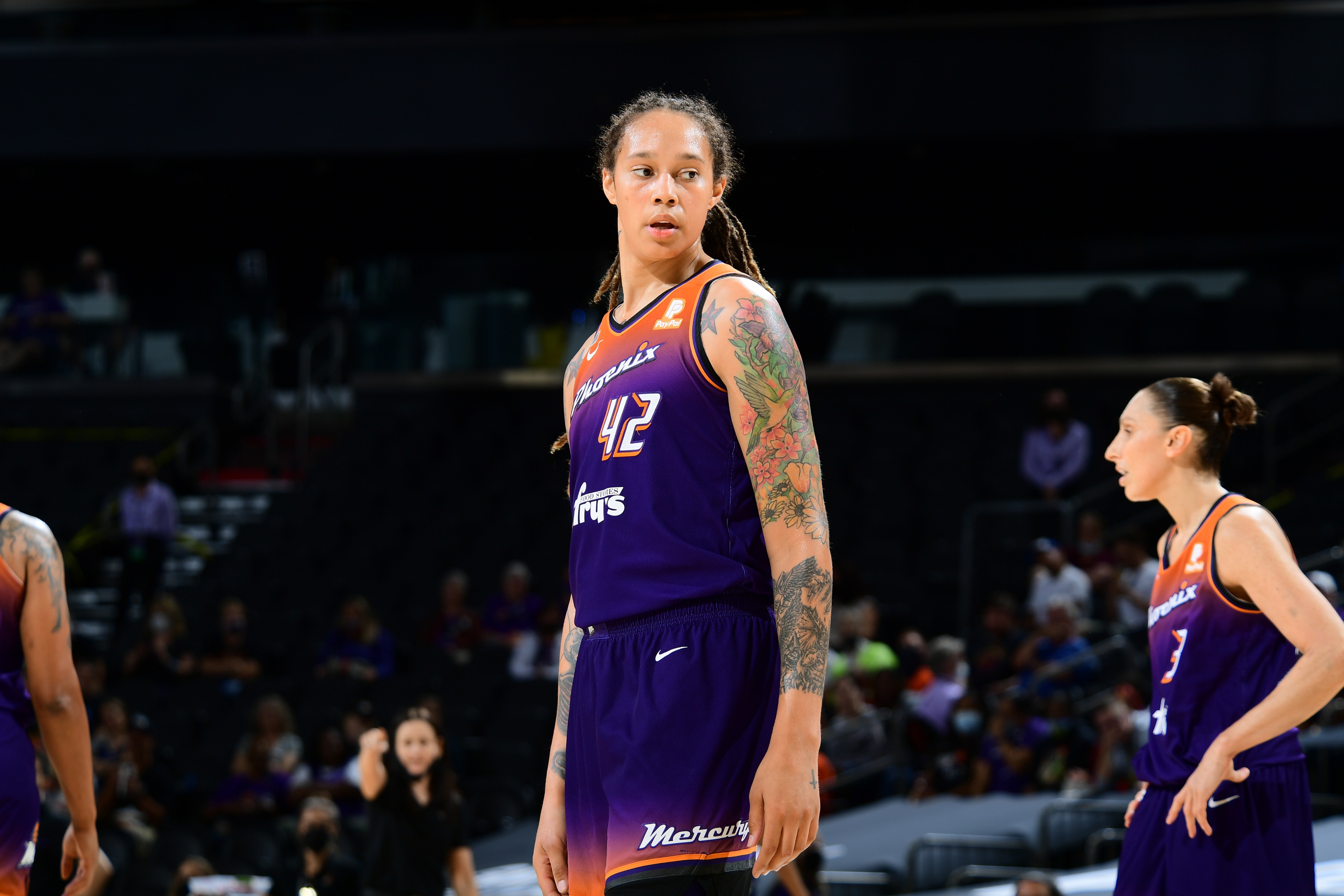 PHOENIX, AZ - AUGUST 31:  Brittney Griner #42 of the Phoenix Mercury looks on during the game against the Chicago Sky on August 31, 2021 at the Footprint Center in Phoenix, Arizona. NOTE TO USER: User expressly acknowledges and agrees that, by downloading and or using this photograph, user is consenting to the terms and conditions of the Getty Images License Agreement. Mandatory Copyright Notice: Copyright 2021 NBAE (Photo by Michael Gonzales/NBAE via Getty Images)