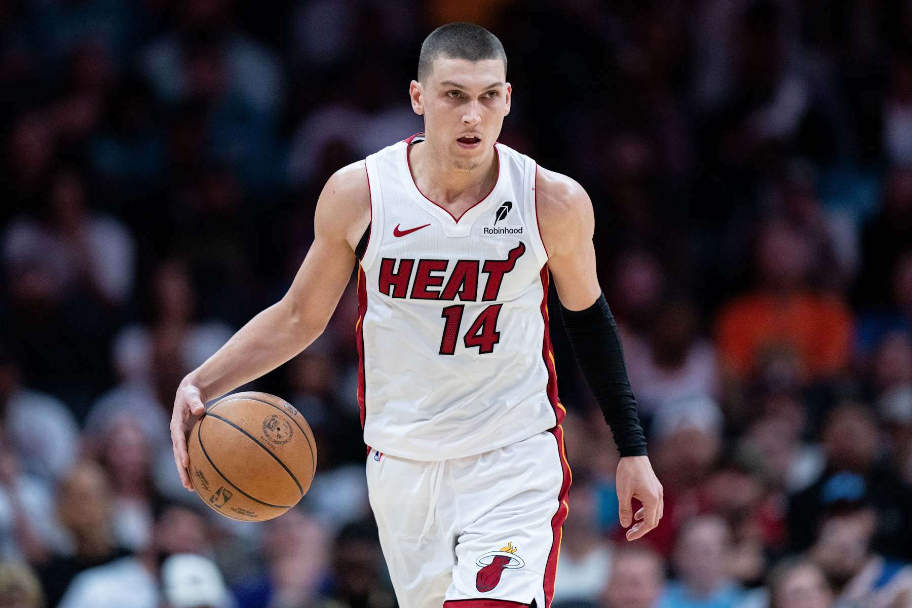 CHARLOTTE, NORTH CAROLINA - OCTOBER 26: Tyler Herro #14 of the Miami Heat plays against the Charlotte Hornets during their game at Spectrum Center on October 26, 2024 in Charlotte, North Carolina. NOTE TO USER: User expressly acknowledges and agrees that, by downloading and or using this photograph, User is consenting to the terms and conditions of the Getty Images License Agreement. (Photo by Jacob Kupferman/Getty Images)