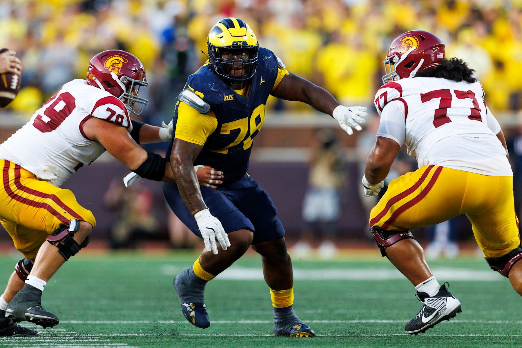 ANN ARBOR, MICHIGAN - SEPTEMBER 21: Kenneth Grant #78 of the Michigan Wolverines rushes the edge during the second half against USC Trojans at Michigan Stadium on September 21, 2024 in Ann Arbor, Michigan. (Photo by Ric Tapia/Getty Images)
