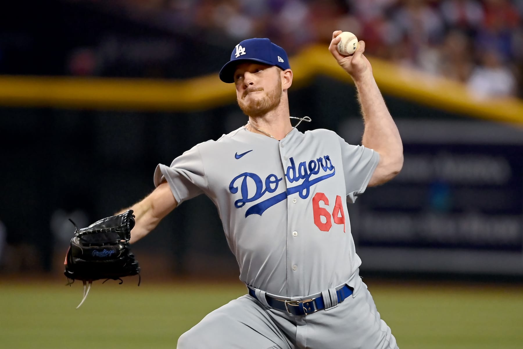 PHOENIX, ARIZONA - OCTOBER 11: Caleb Ferguson #64 of the Los Angeles Dodgers pitches in the fifth inning against the Arizona Diamondbacks during Game Three of the Division Series at Chase Field on October 11, 2023 in Phoenix, Arizona. (Photo by Norm Hall/Getty Images)