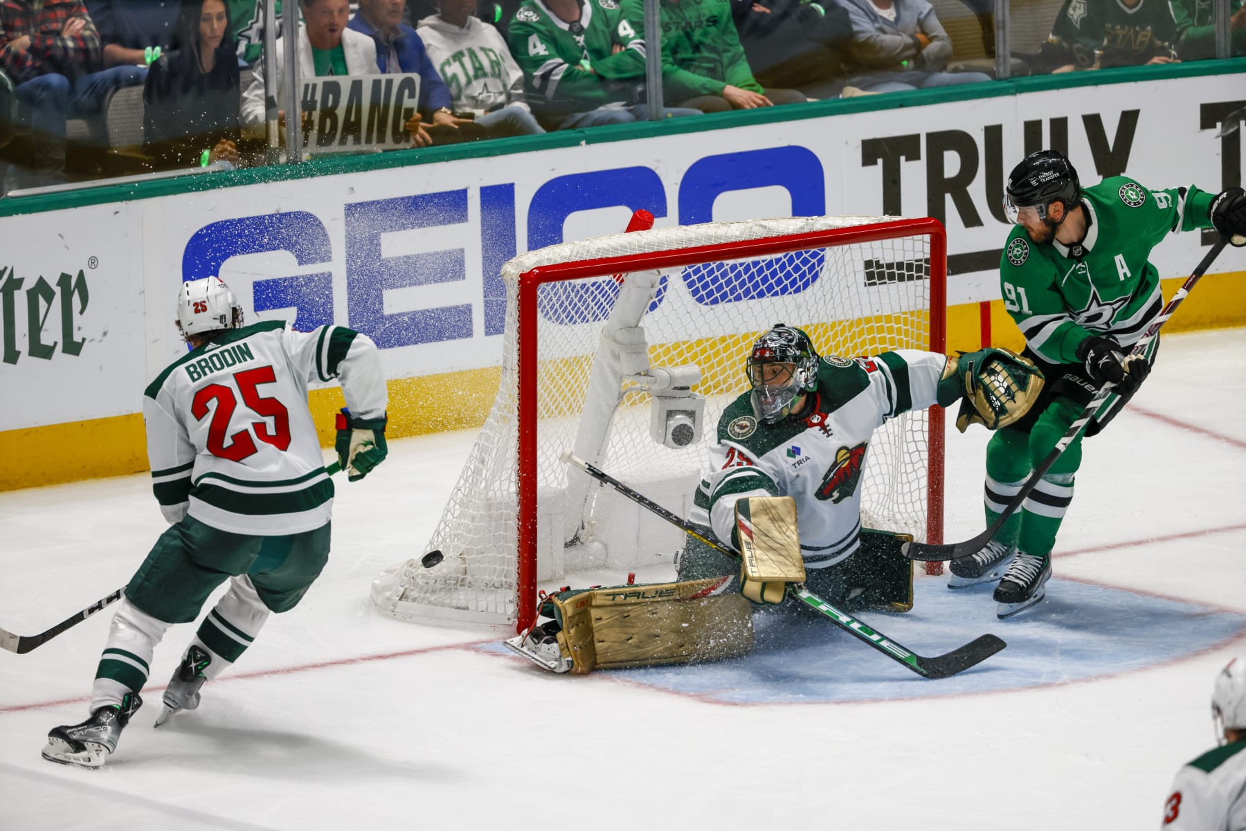 DALLAS, TX - APRIL 19: Dallas Stars center Tyler Seguin (91) tries to flip the puck past Minnesota Wild goaltender Marc-Andre Fleury (29) during the game between the Dallas Stars and the Minnesota Wild on April 19, 2023 at American Airlines Center in Dallas, Texas. (Photo by Matthew Pearce/Icon Sportswire via Getty Images)