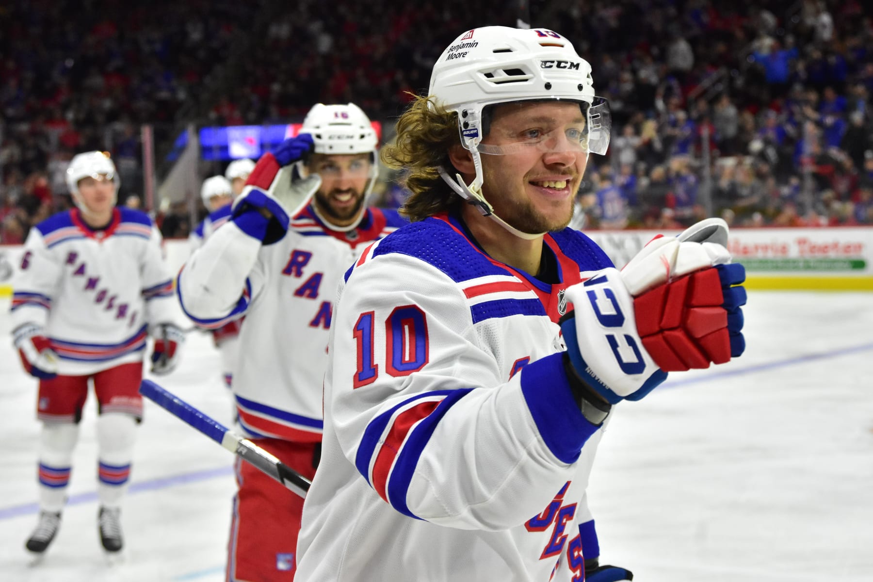 RALEIGH, NC - FEBRUARY 11: New York Rangers Left Wing Artemi Panarin (10) fist bumps teammates after scoring during the game between the New York Rangers and the Carolina Hurricanes on February 11, 2023 at PNC Arena in Raleigh, North Carolina. (Photo by Katherine Gawlik/Icon Sportswire via Getty Images)