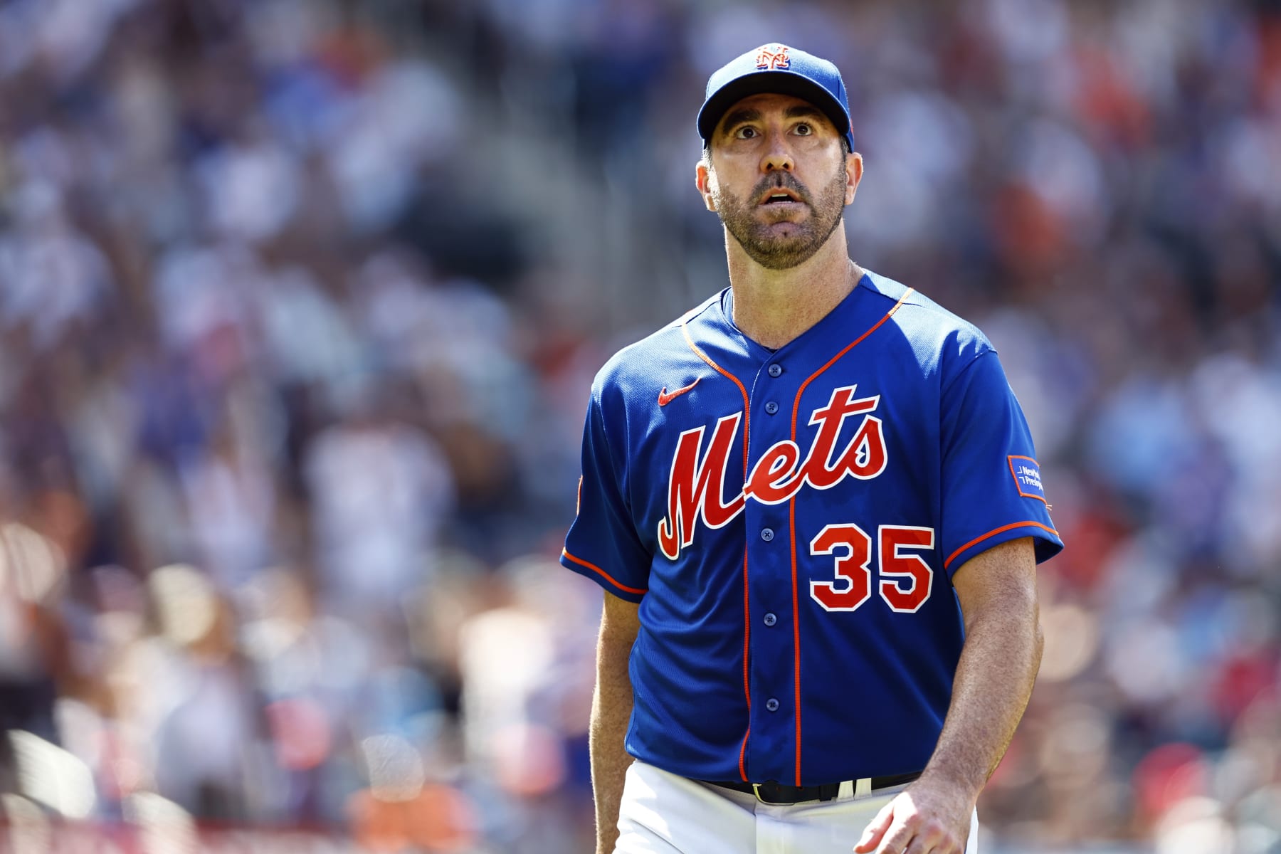 NEW YORK, NEW YORK - JULY 30: Pitcher Justin Verlander #35 of the New York Mets looks at the crowd after being relieved in the sixth inning of a game against the Washington Nationals at Citi Field on July 30, 2023 in New York City. The Mets defeated the Nationals 5-2 as Verlander recorded his 250th career win. (Photo by Rich Schultz/Getty Images)