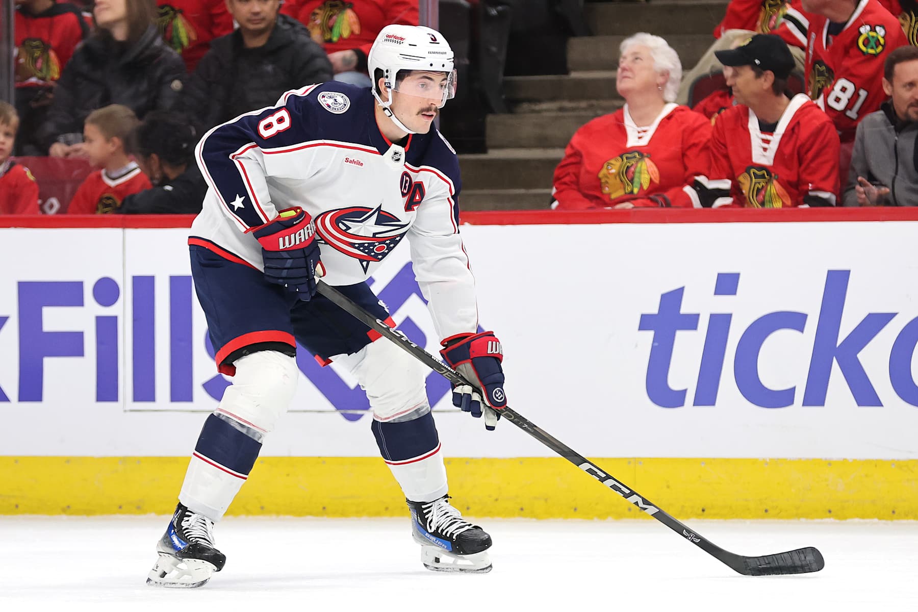 CHICAGO, ILLINOIS - DECEMBER 01: Zach Werenski #8 of the Columbus Blue Jackets looks on against the Chicago Blackhawks during the first period at the United Center on December 01, 2024 in Chicago, Illinois. (Photo by Michael Reaves/Getty Images)