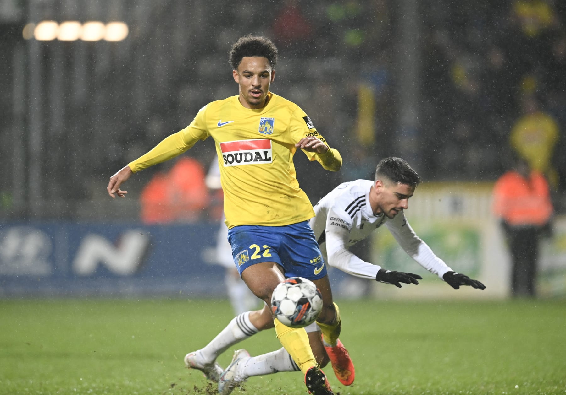 Westerlo's Bryan Reynolds and Eupen's Davo fight for the ball during a soccer match between KAS Eupen and KVC Westerlo, Saturday 04 February 2023 in Eupen, on day 24 of the 2022-2023 'Jupiler Pro League' first division of the Belgian championship. BELGA PHOTO JOHN THYS (Photo by JOHN THYS / BELGA MAG / Belga via AFP) (Photo by JOHN THYS/BELGA MAG/AFP via Getty Images)