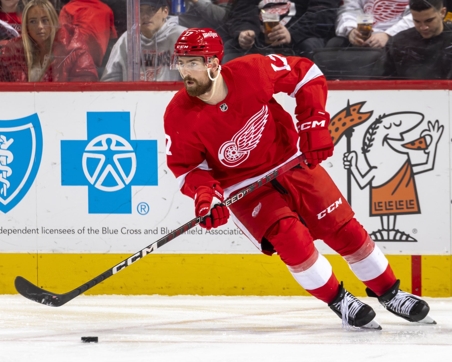 DETROIT, MI - JANUARY 06: Filip Hronek #17 of the Detroit Red Wings turns up ice with the puck against the Florida Panthers during the second period of an NHL game at Little Caesars Arena on January 6, 2023 in Detroit, Michigan. Florida defeated Detroit 3-2. (Photo by Dave Reginek/NHLI via Getty Images)