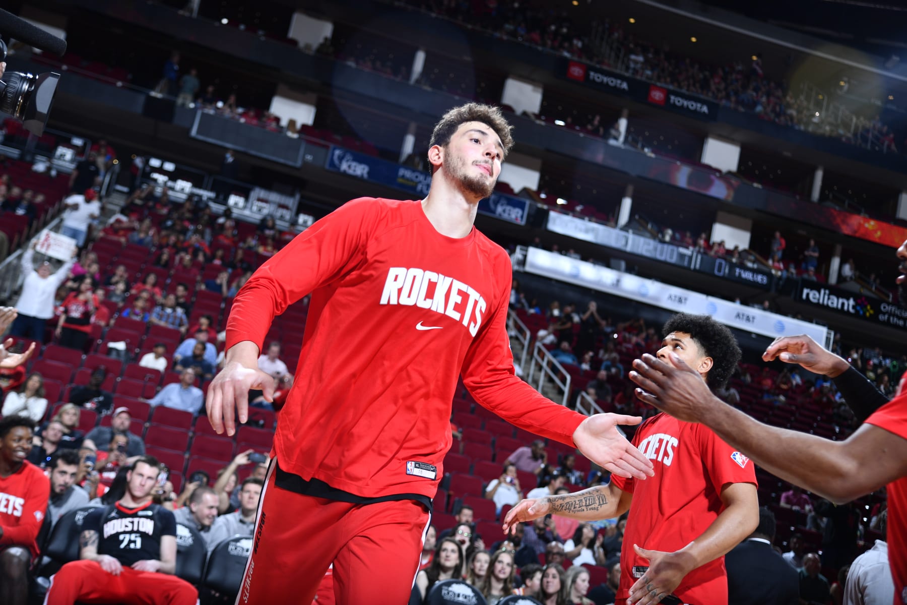 HOUSTON, TX - APRIL 3: Alperen Sengun #28 of the Houston Rockets high fives his teammates before the game against the Minnesota Timberwolves on April 3, 2022 at the Toyota Center in Houston, Texas. NOTE TO USER: User expressly acknowledges and agrees that, by downloading and or using this photograph, user is consenting to the terms and conditions of the Getty Images License Agreement. Mandatory Copyright Notice: Copyright 2022 NBAE (Photos by Logan Riely/NBAE via Getty Images)