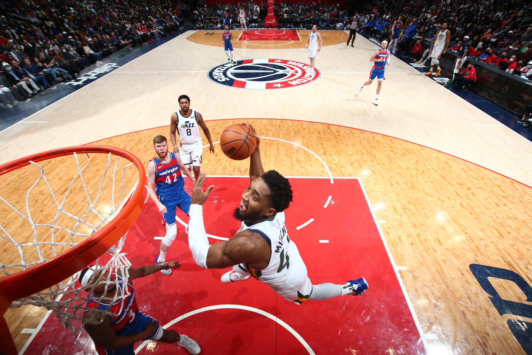 WASHINGTON, DC -  DECEMBER 11: Donovan Mitchell #45 of the Utah Jazz shoots the ball during the game against the Washington Wizards on December 11, 2021 at Capital One Arena in Washington, DC. NOTE TO USER: User expressly acknowledges and agrees that, by downloading and or using this Photograph, user is consenting to the terms and conditions of the Getty Images License Agreement. Mandatory Copyright Notice: Copyright 2021 NBAE (Photo by Stephen Gosling/NBAE via Getty Images)