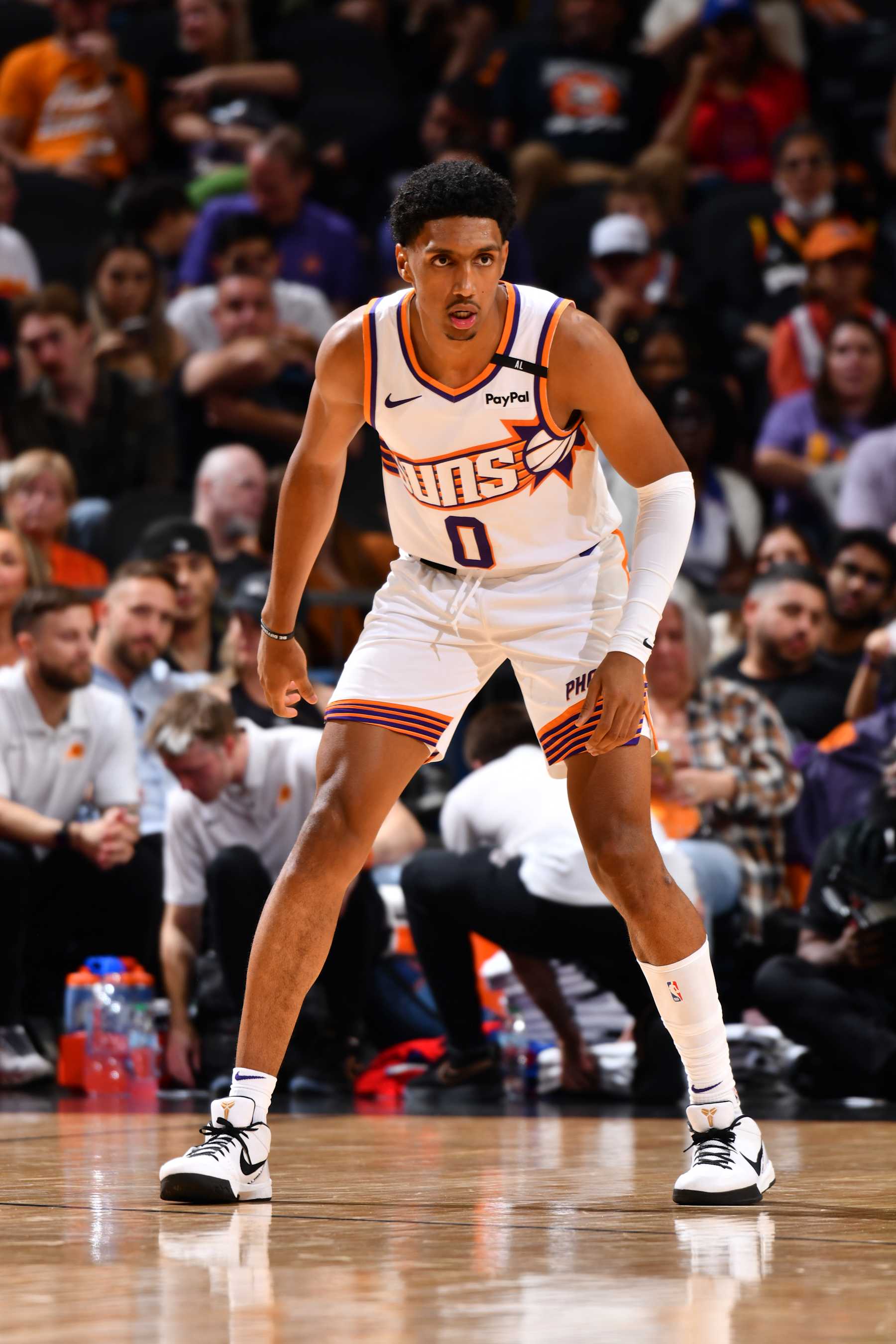 PHOENIX, AZ - OCTOBER 11: Ryan Dunn #0 of the Phoenix Suns looks on during the game against the Detroit Pistons during a NBA preseason game on October 11, 2024 at Footprint Center in Phoenix, Arizona. NOTE TO USER: User expressly acknowledges and agrees that, by downloading and or using this photograph, user is consenting to the terms and conditions of the Getty Images License Agreement. Mandatory Copyright Notice: Copyright 2024 NBAE (Photo by Barry Gossage/NBAE via Getty Images)