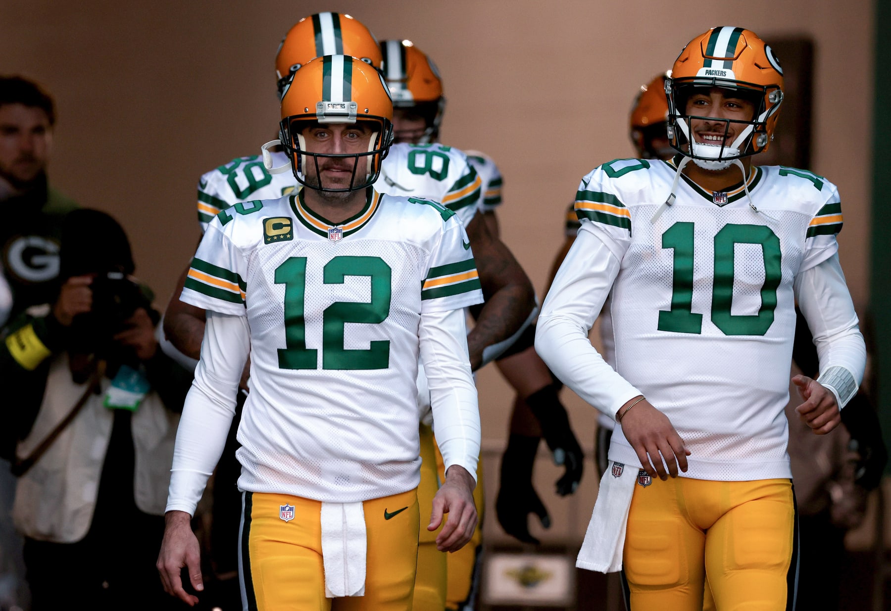 MIAMI GARDENS, FLORIDA - DECEMBER 25: Aaron Rodgers #12 and Jordan Love #10 of the Green Bay Packers take the field prior to a game against the Miami Dolphins at Hard Rock Stadium on December 25, 2022 in Miami Gardens, Florida. (Photo by Megan Briggs/Getty Images)