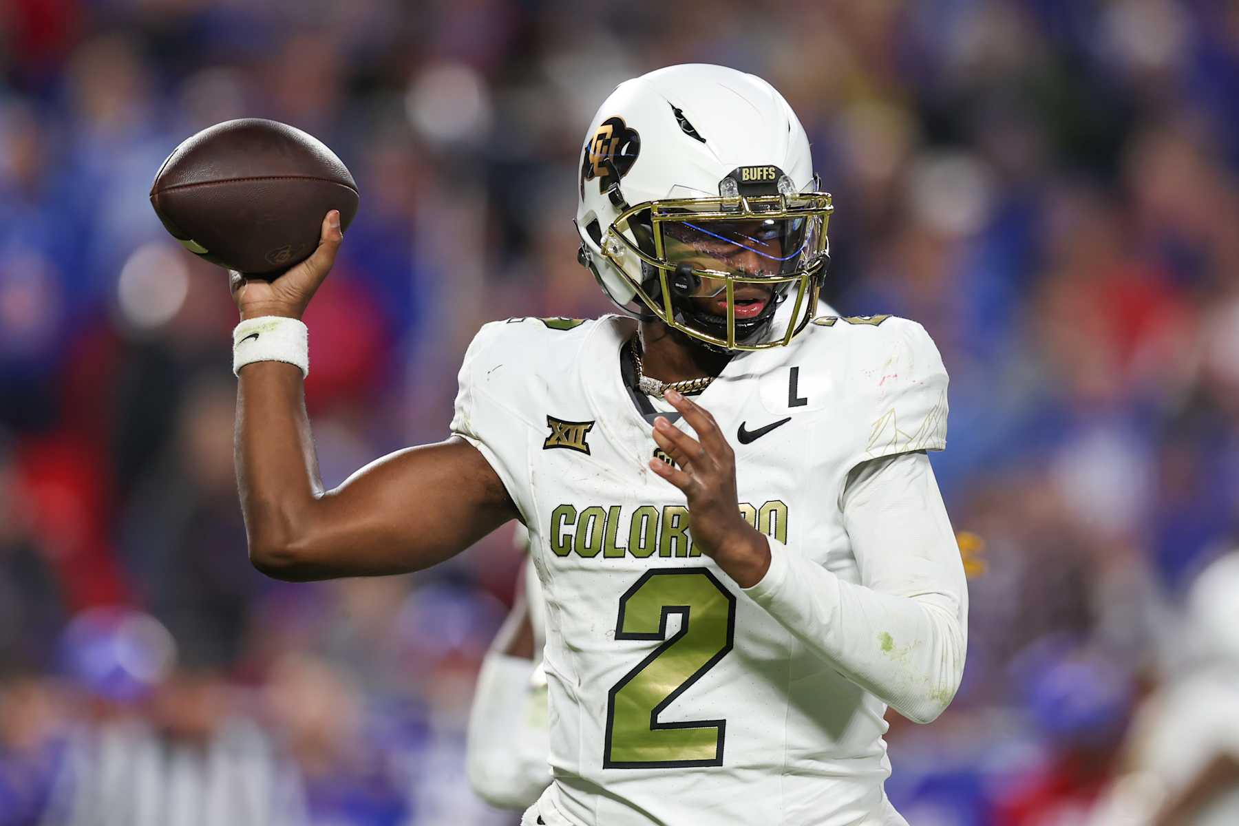 KANSAS CITY, MO - NOVEMBER 23: Colorado Buffaloes quarterback Shedeur Sanders (2) throws a pass in the fourth quarter of a Big 12 game between the Colorado Buffaloes and Kansas Jayhawks on November 23, 2024 at GEHA Field at Arrowhead Stadium in Kansas City, MO. (Photo by Scott Winters/Icon Sportswire via Getty Images)