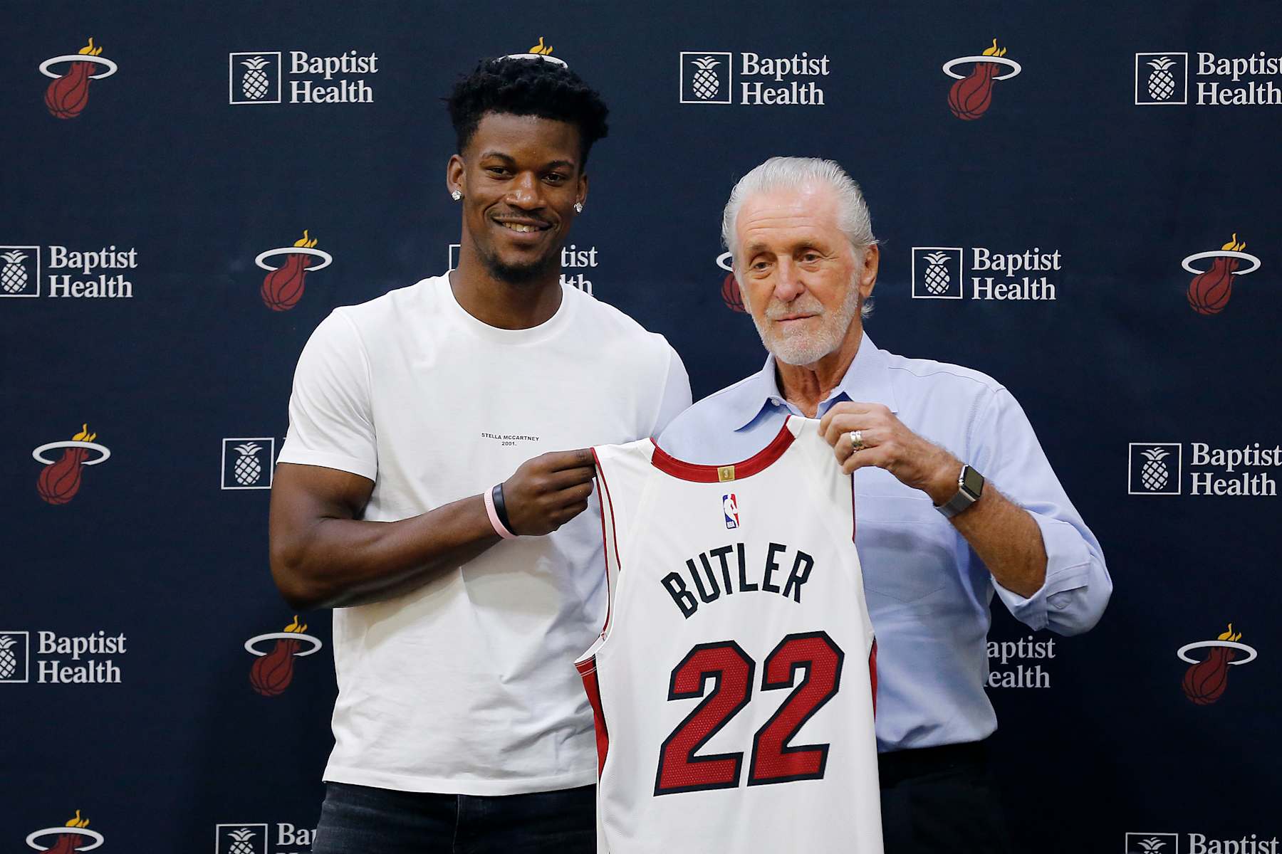 MIAMI, FLORIDA - SEPTEMBER 27:  Jimmy Butler #22 of the Miami Heat poses for a photo with president Pat Riley during his introductory press conference at American Airlines Arena on September 27, 2019 in Miami, Florida. NOTE TO USER: User expressly acknowledges and agrees that, by downloading and or using this photograph, User is consenting to the terms and conditions of the Getty Images License Agreement.  (Photo by Michael Reaves/Getty Images)