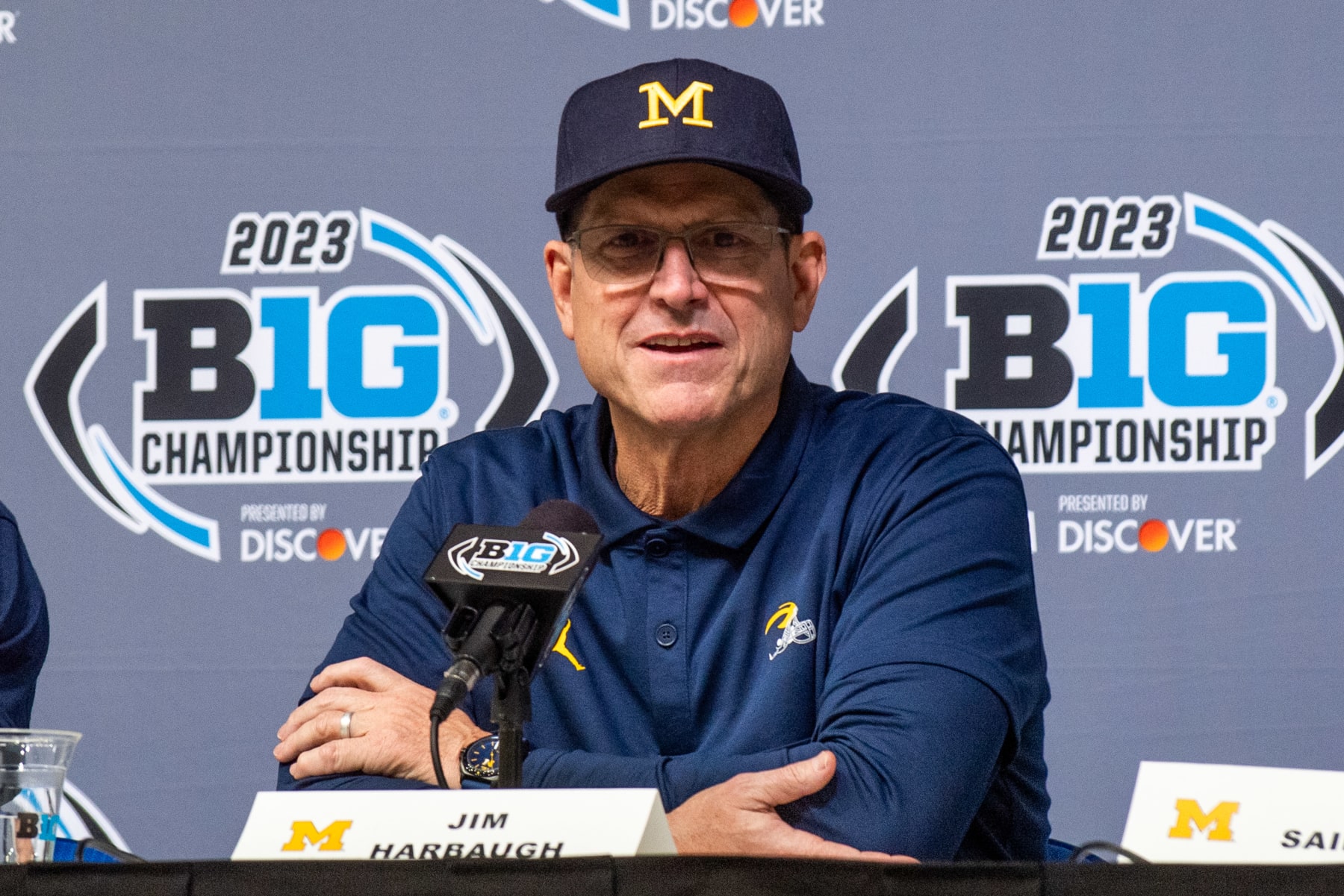 INDIANAPOLIS, INDIANA - DECEMBER 02:  Head Football Coach Jim Harbaugh of the Michigan Wolverines speaks to media during the post game press conference after the Big Ten Championship against the Iowa Hawkeyes at Lucas Oil Stadium on December 02, 2023 in Indianapolis, Indiana. The Michigan Wolverines won the game 26-0. (Photo by Aaron J. Thornton/Getty Images)