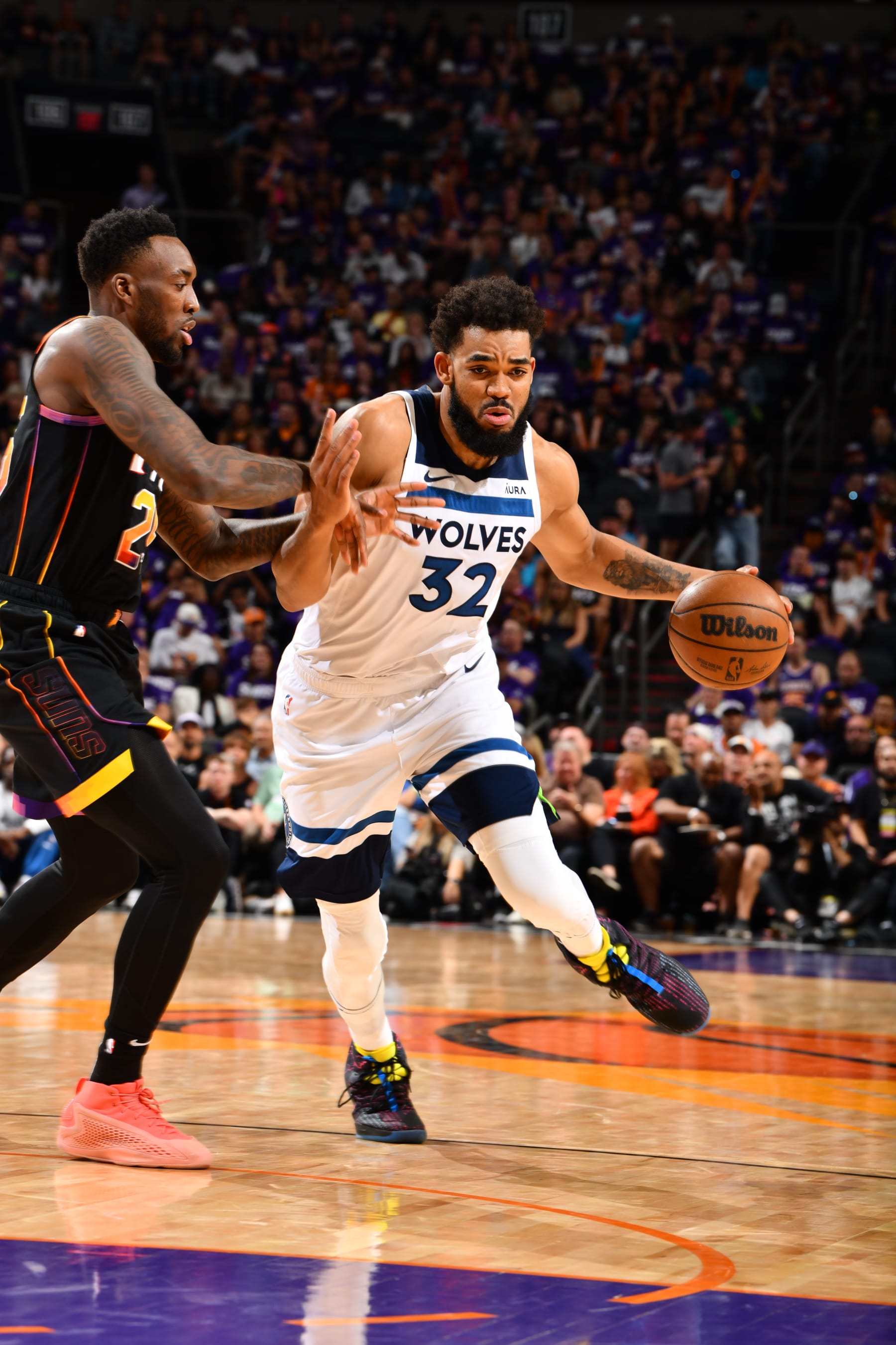 PHOENIX, AZ - APRIL 4: Karl-Anthony Towns #32 of the Minnesota Timberwolves drives to the basket during the game against the Phoenix Suns during Round 1 Game 4 of the 2024 NBA Playoffs on April 4, 2023 at Footprint Center in Phoenix, Arizona. NOTE TO USER: User expressly acknowledges and agrees that, by downloading and or using this photograph, user is consenting to the terms and conditions of the Getty Images License Agreement. Mandatory Copyright Notice: Copyright 2024 NBAE (Photo by Barry Gossage/NBAE via Getty Images)